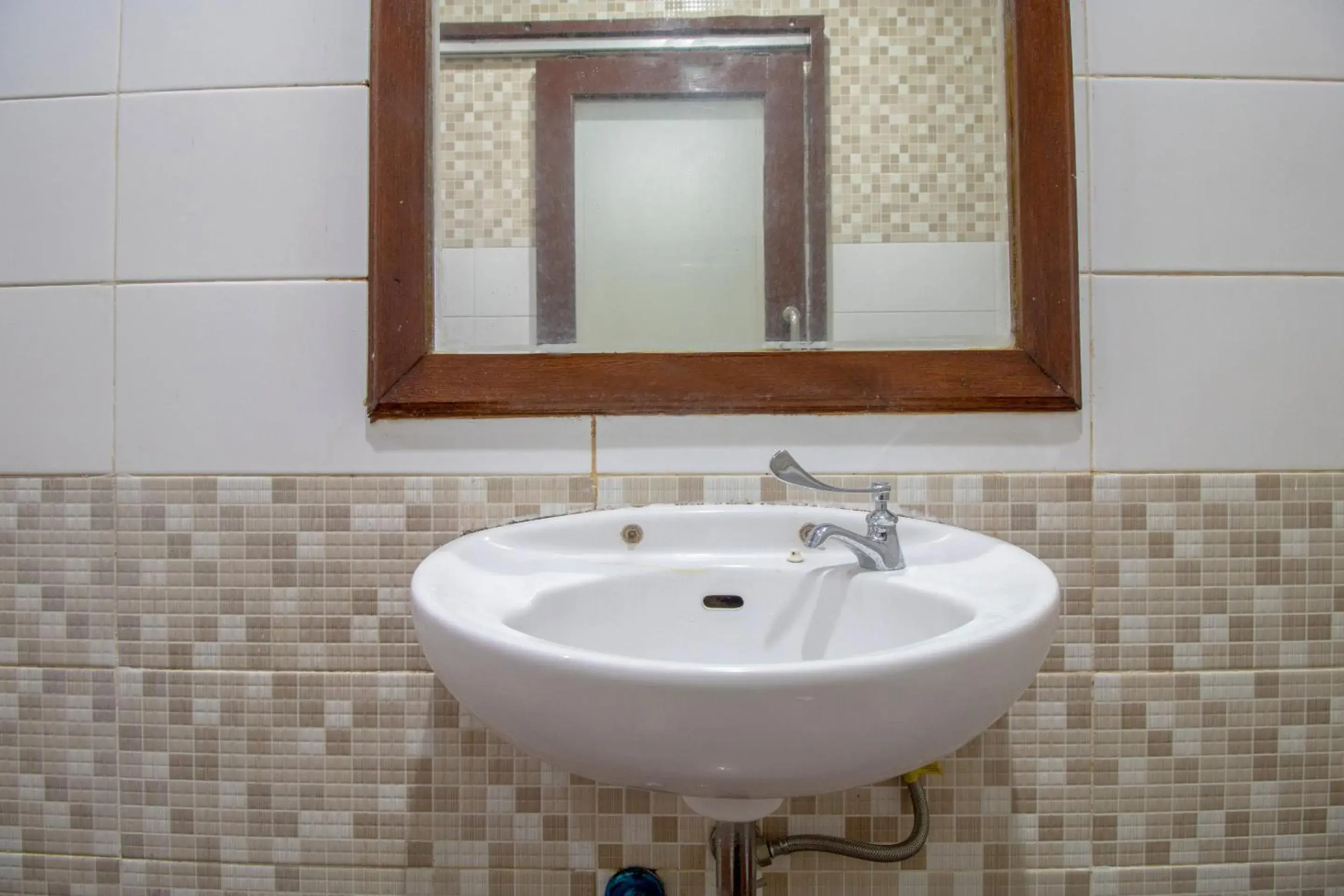 Bathroom in SUPER OYO Flagship 2688 Guntur Hotel