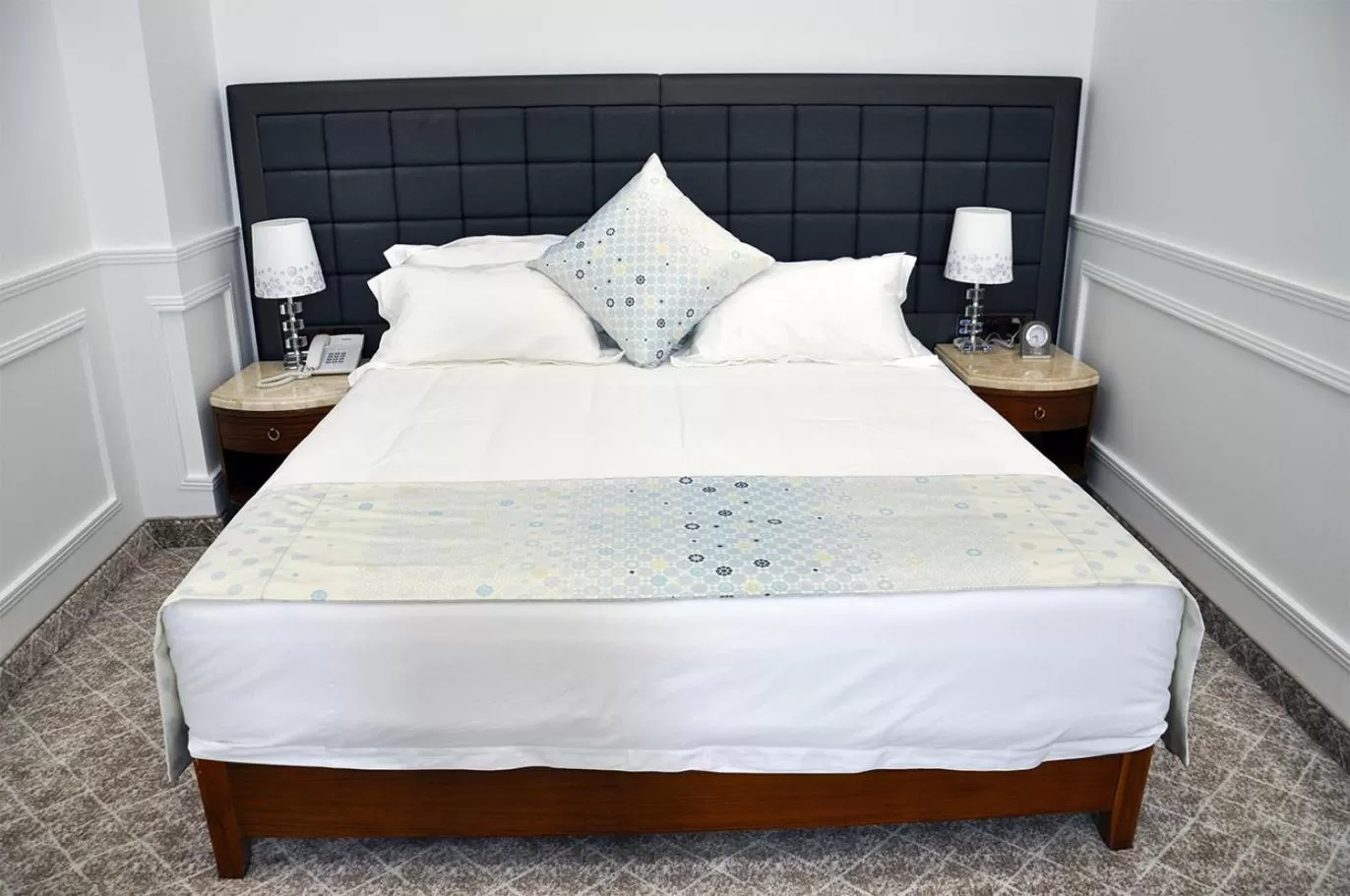 Bed in Parliament Palace Hotel