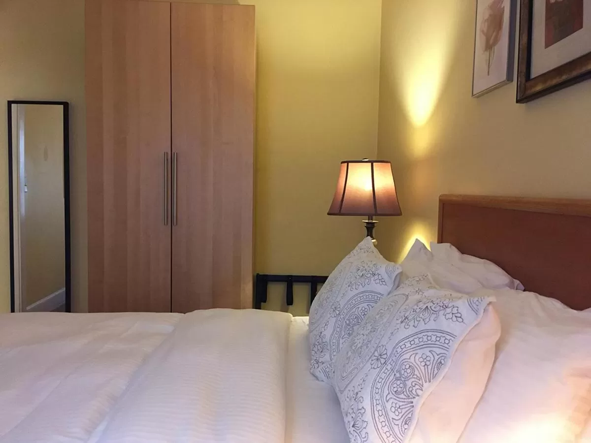 Bed in Morris House Hotel