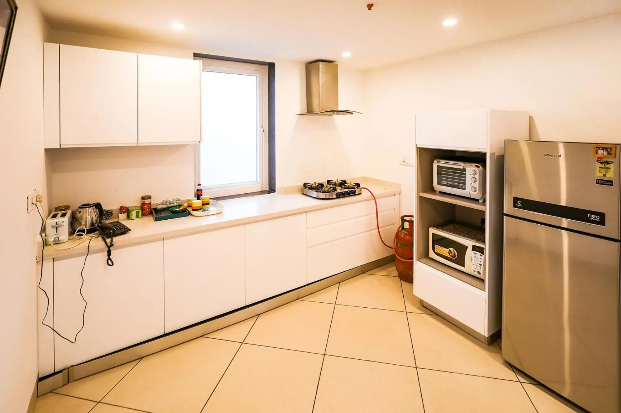 Kitchen or kitchenette, Kitchen/Kitchenette in FabHotel La Paz Stay B&B