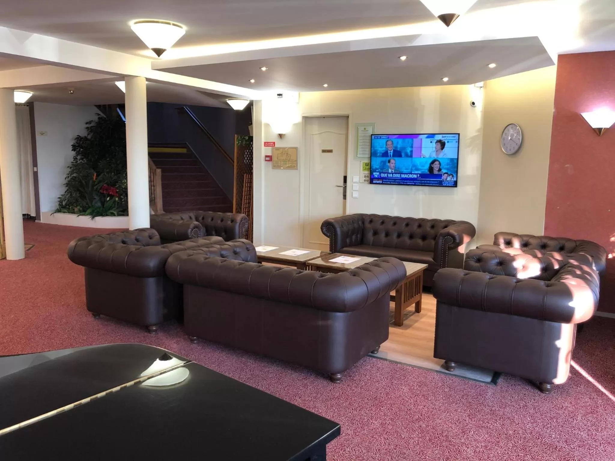 Communal lounge/ TV room in Logis Hotel Altina