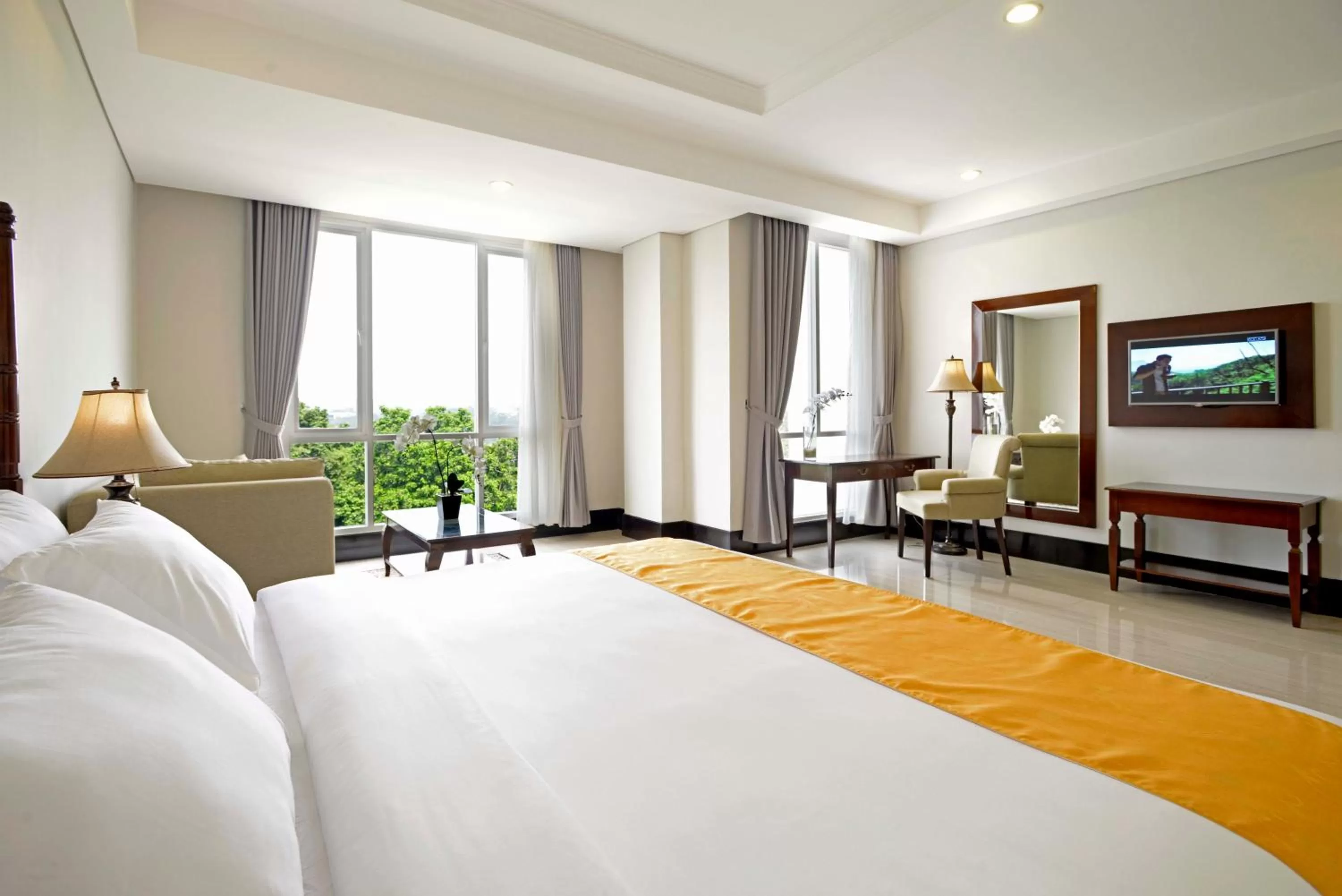 Living room, Bed in The Sahira Hotel Syariah