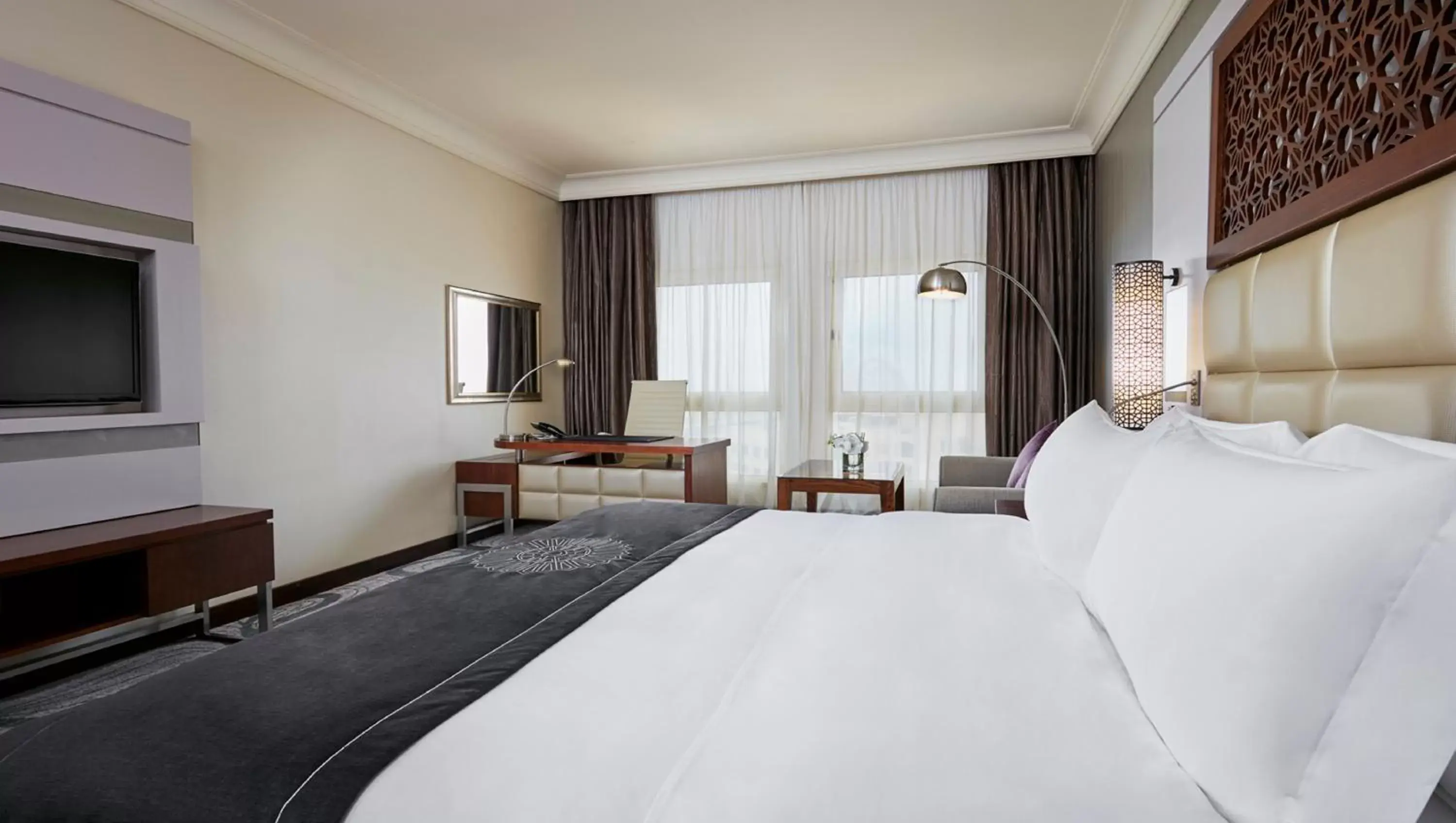 Bedroom in InterContinental Doha Beach & Spa, an IHG Hotel Bedroom in InterContinental Doha Beach & Spa, an IHG Hotel