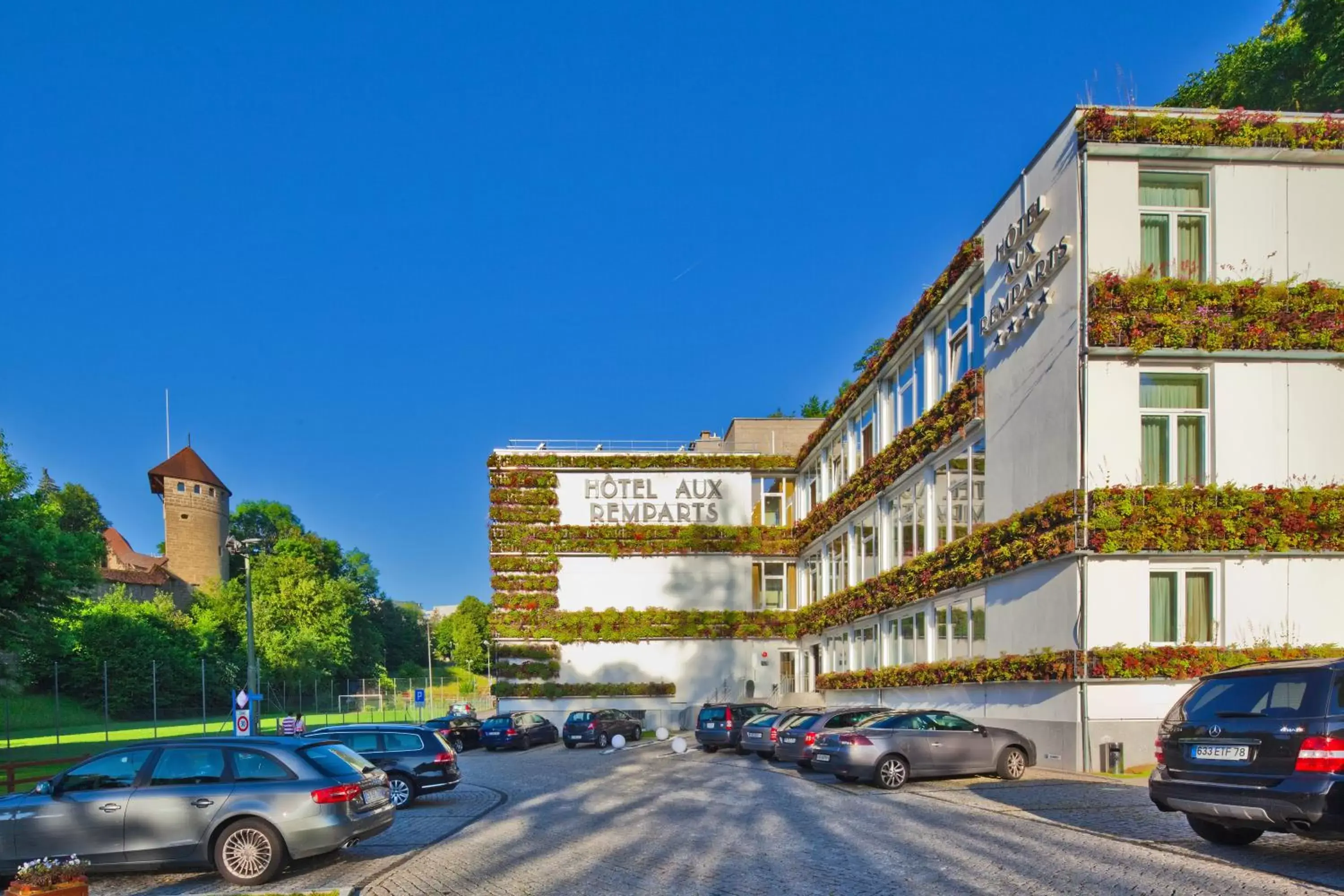 Facade/entrance, Property Building in Hôtel Fribourg Centre Remparts By Mercure