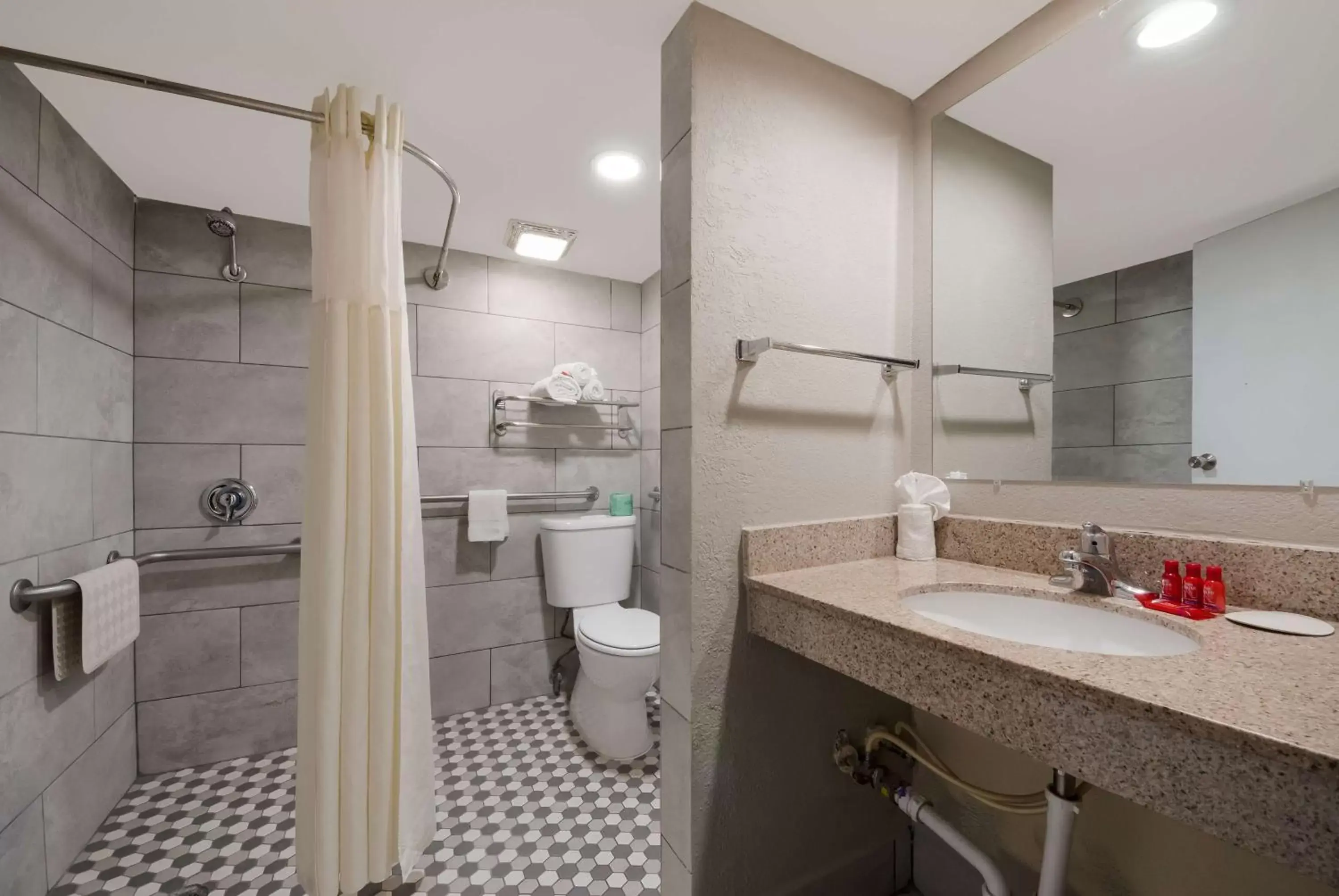 Bathroom in SureStay Plus Hotel by Best Western San Antonio North
