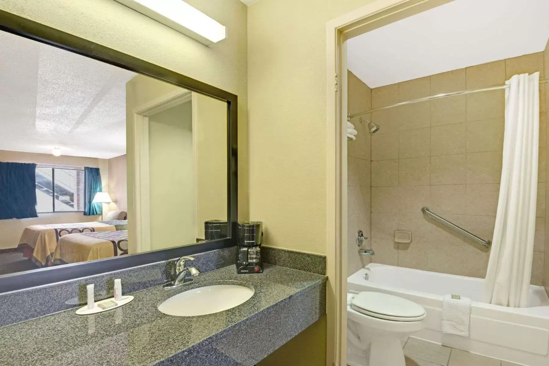 Bathroom in Super 8 by Wyndham Universal City