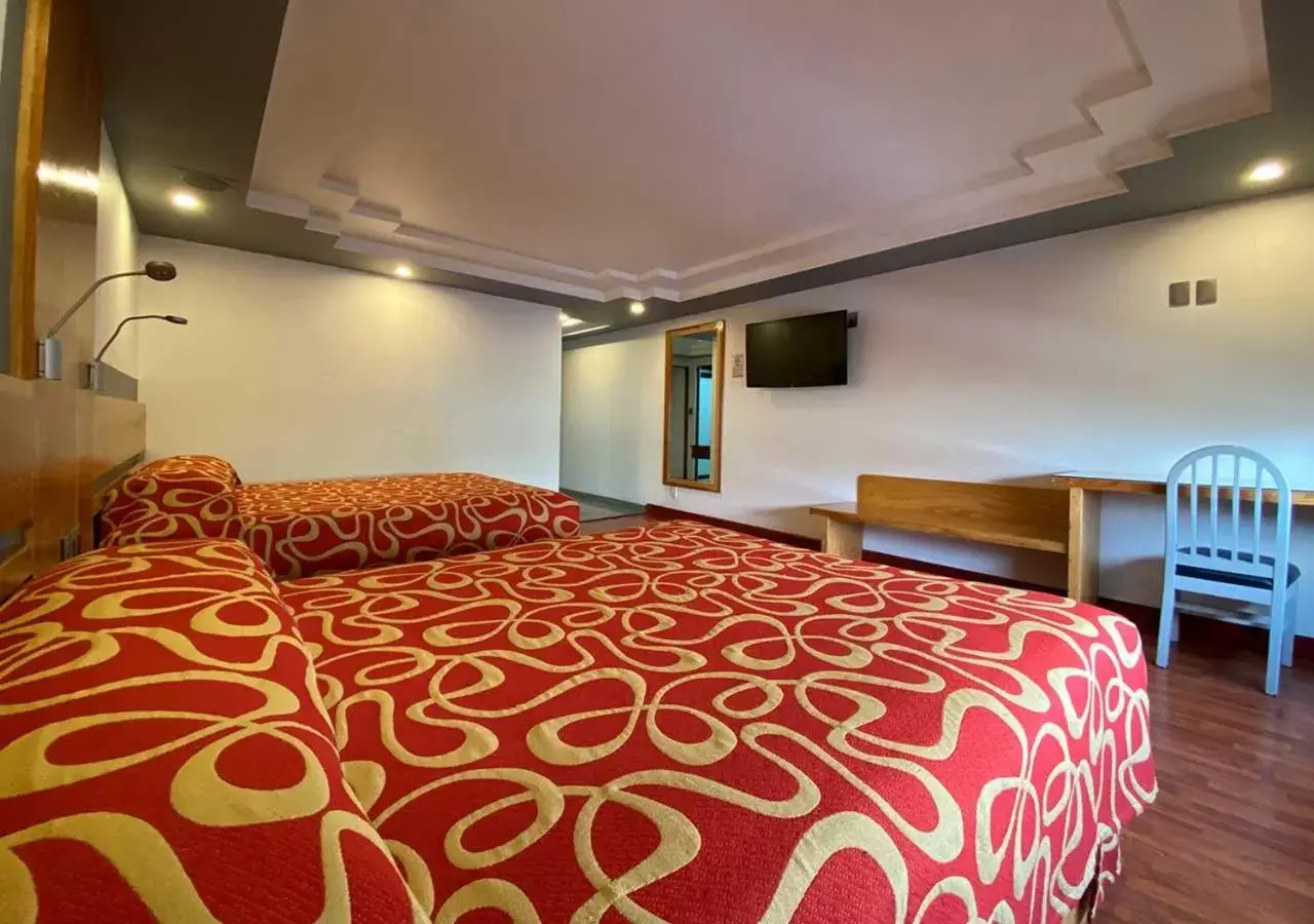 Bed in Hotel Escala Siglo XXI