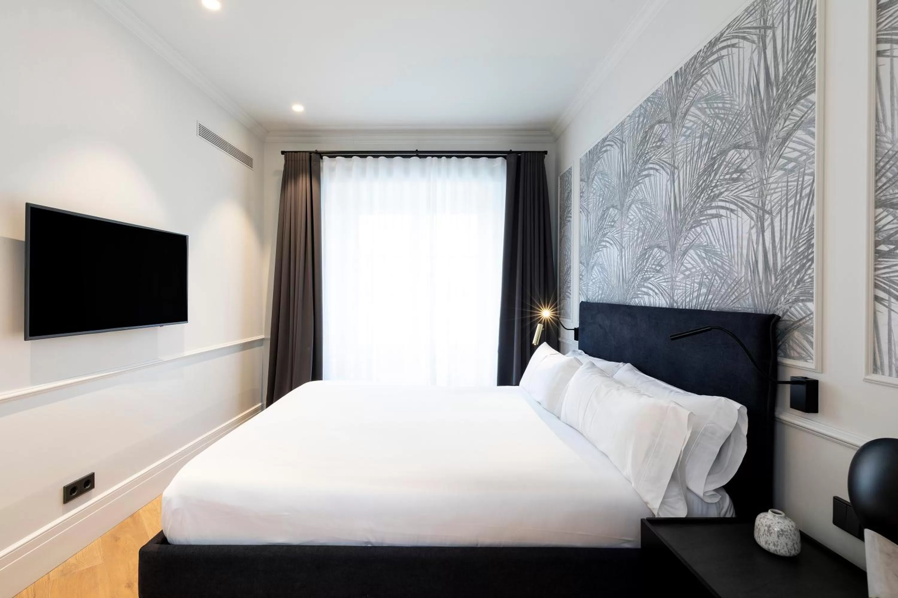 Bed in Maldà Singular Hotel