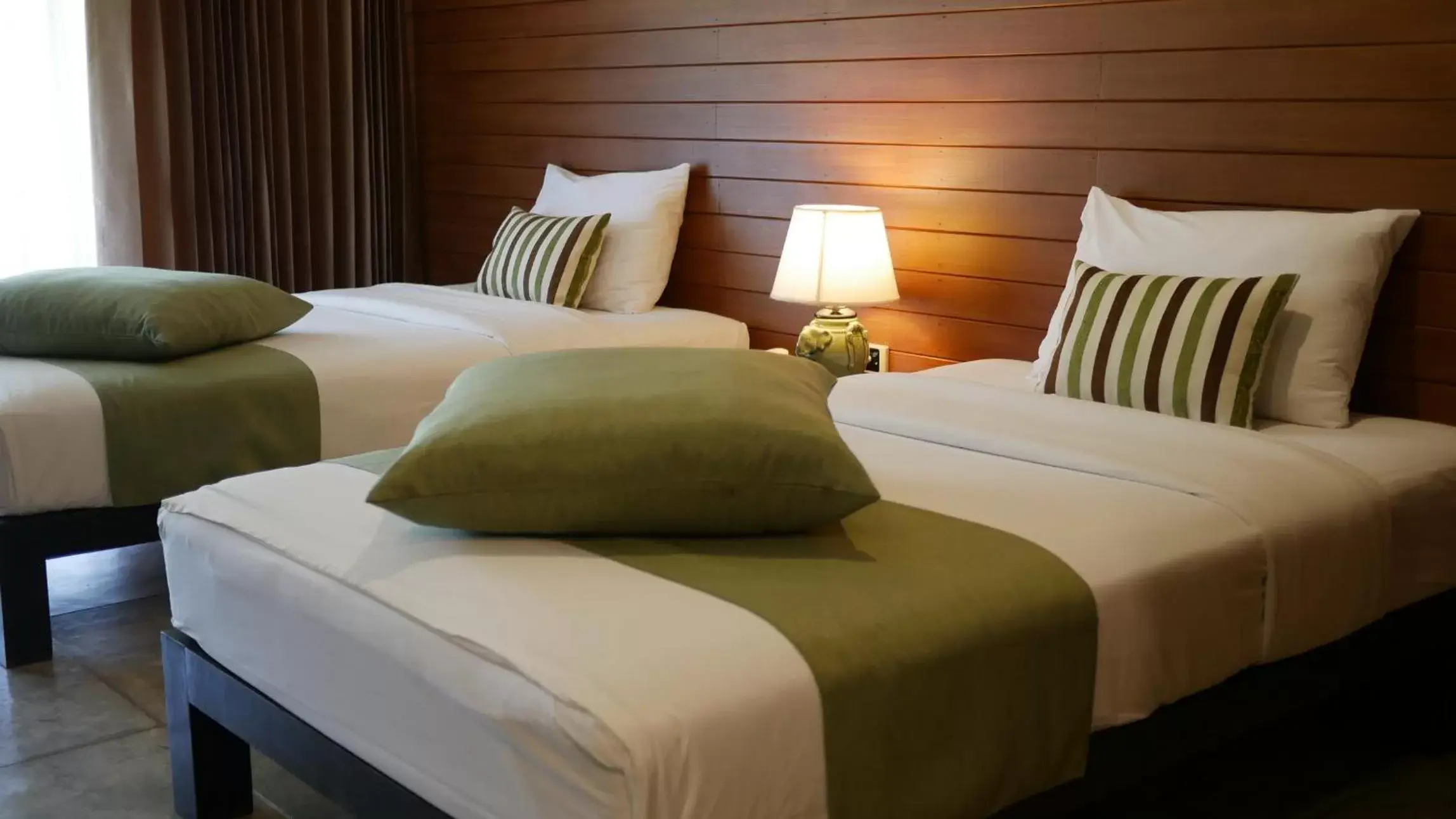 Bed in Royal River Kwai Resort and Spa -SHA Extra Plus