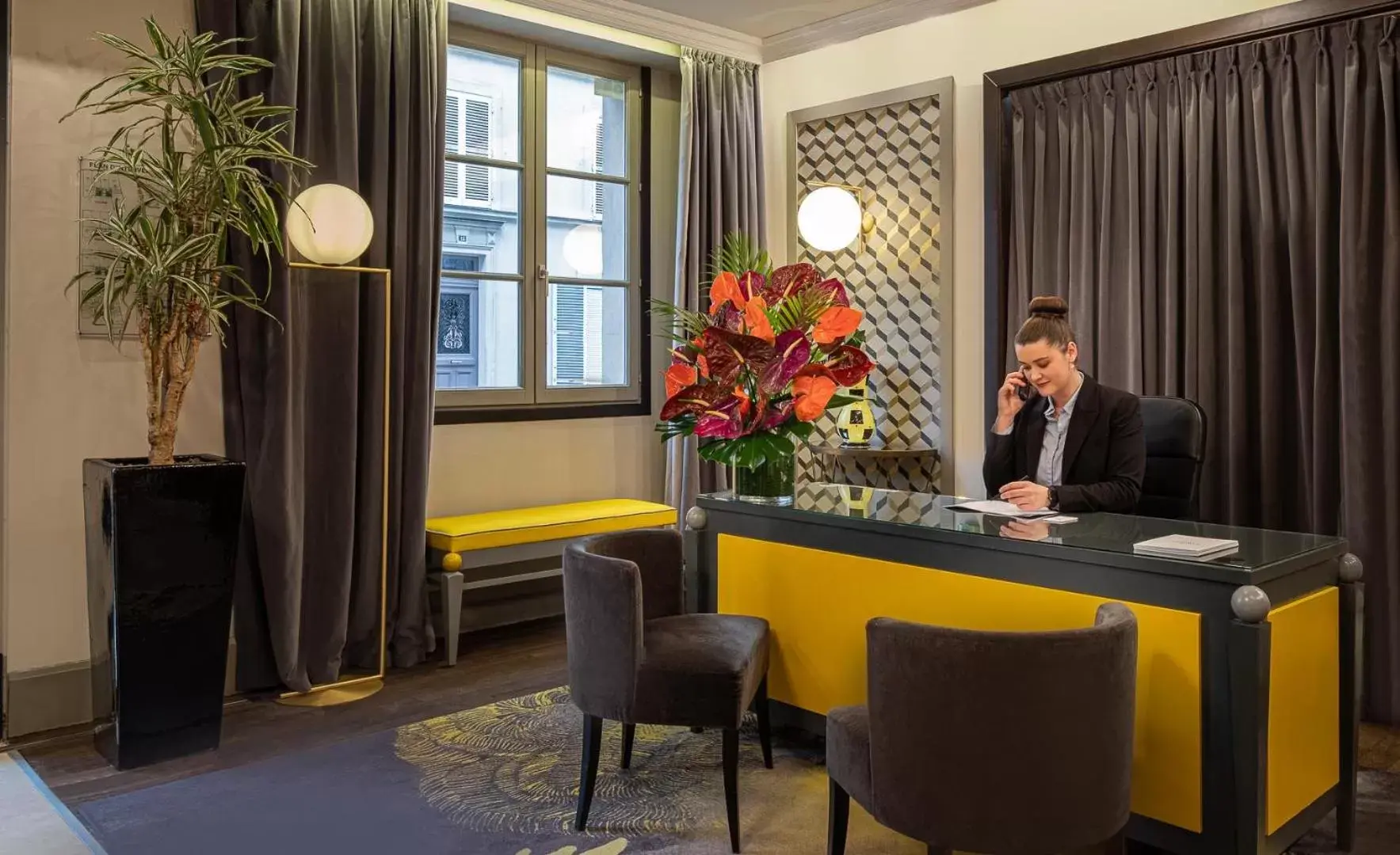 Staff in Hôtel Le Marquis by Inwood Hotels