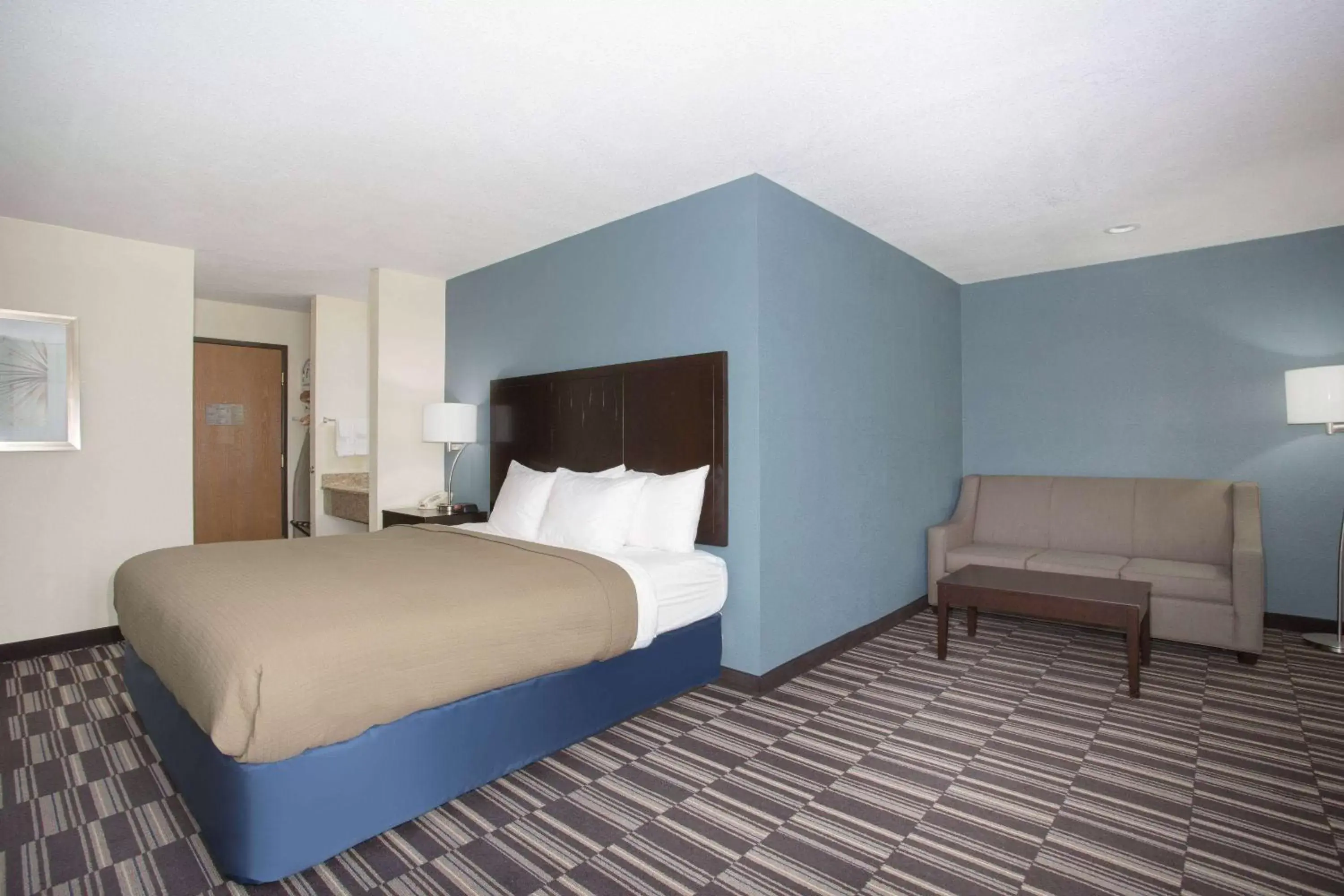 Photo of the whole room, Bed in AmericInn by Wyndham Mount Pleasant