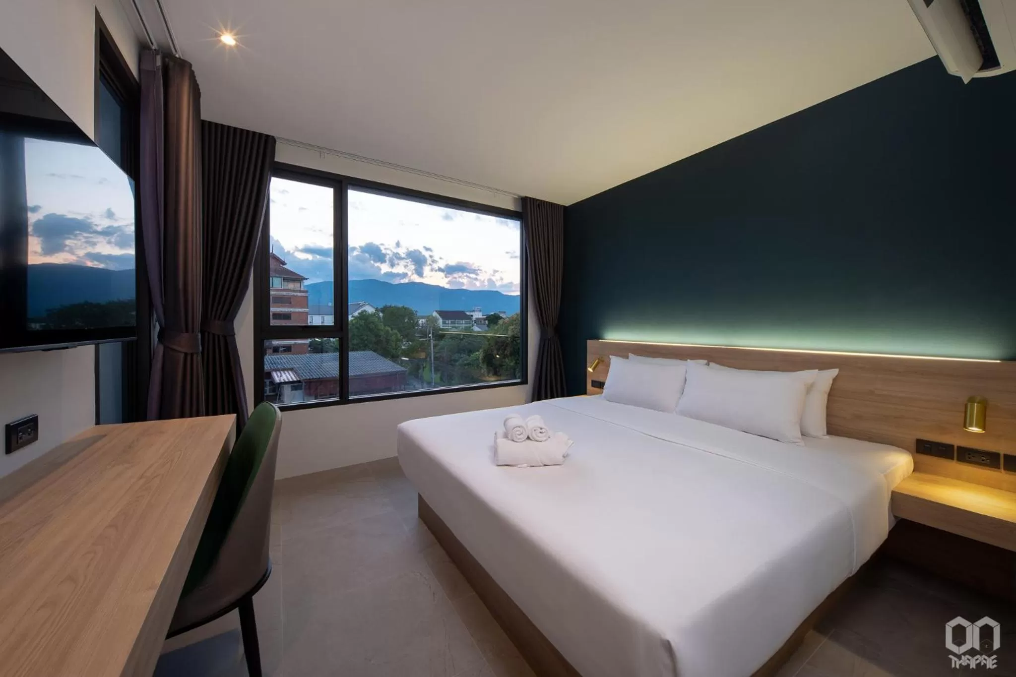 Photo of the whole room, Bed in ON Thapae Gate Chiangmai