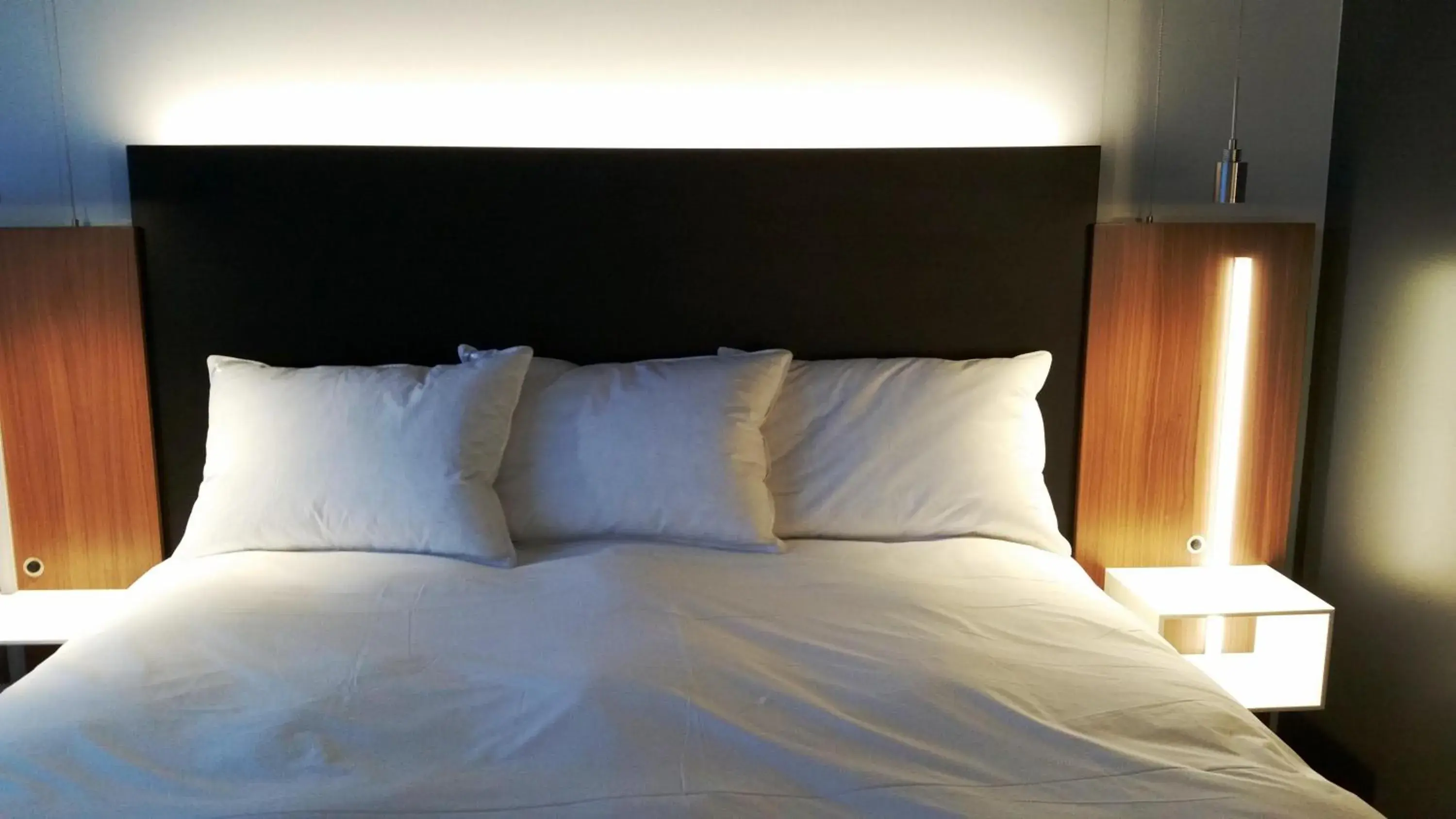 Bed in Grand Times Hotel Drummondville