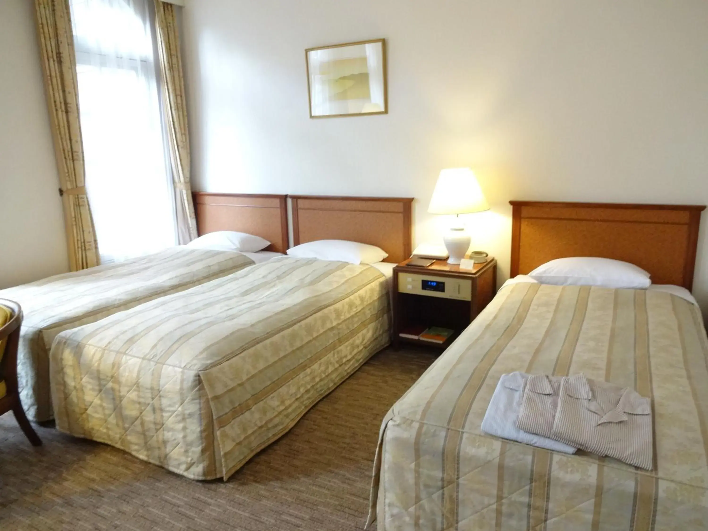 Bed in Kyu Karuizawa Hotel Otowa No Mori
