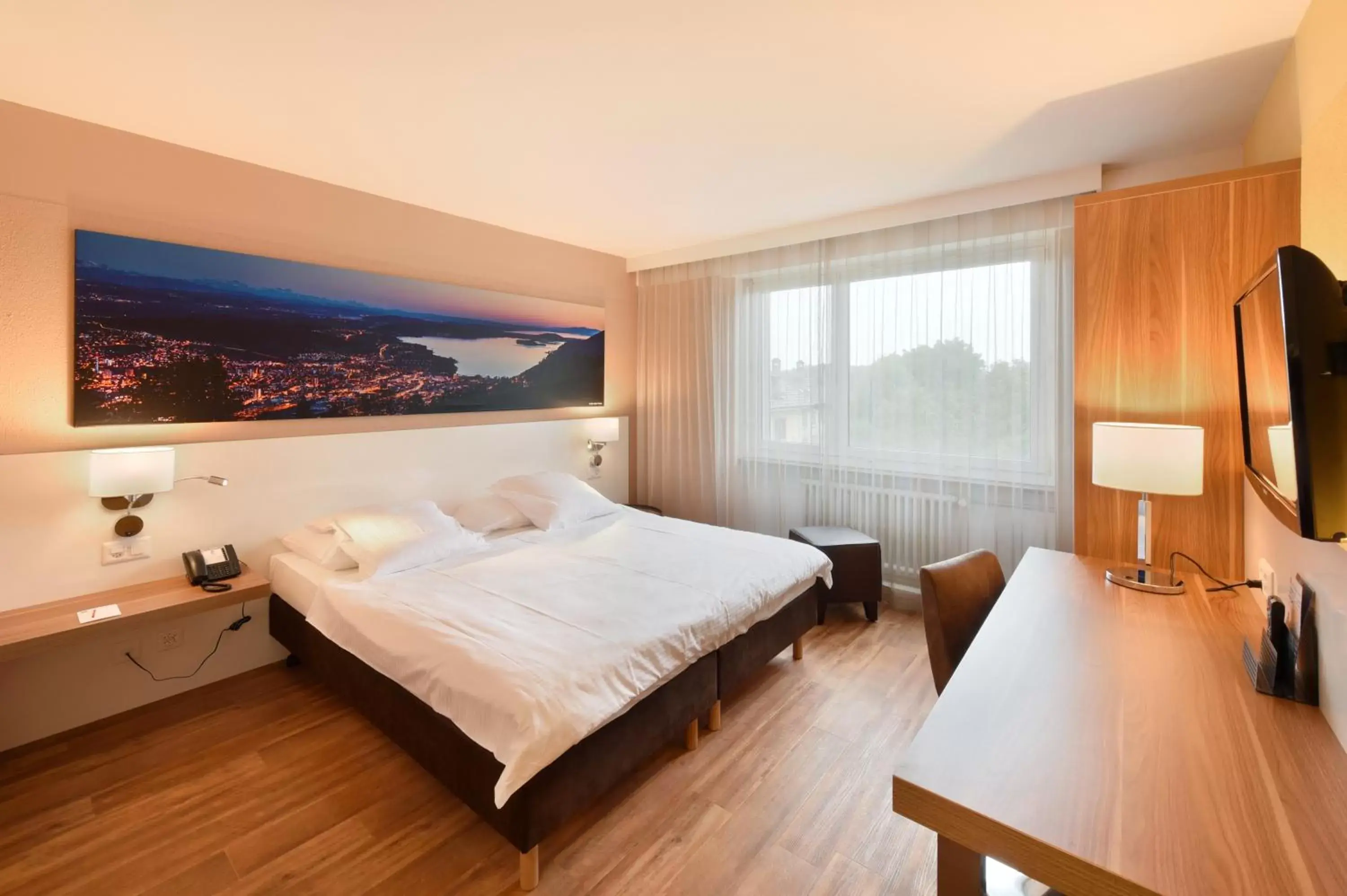 Photo of the whole room, Bed in City Hotel Biel Bienne Free Parking