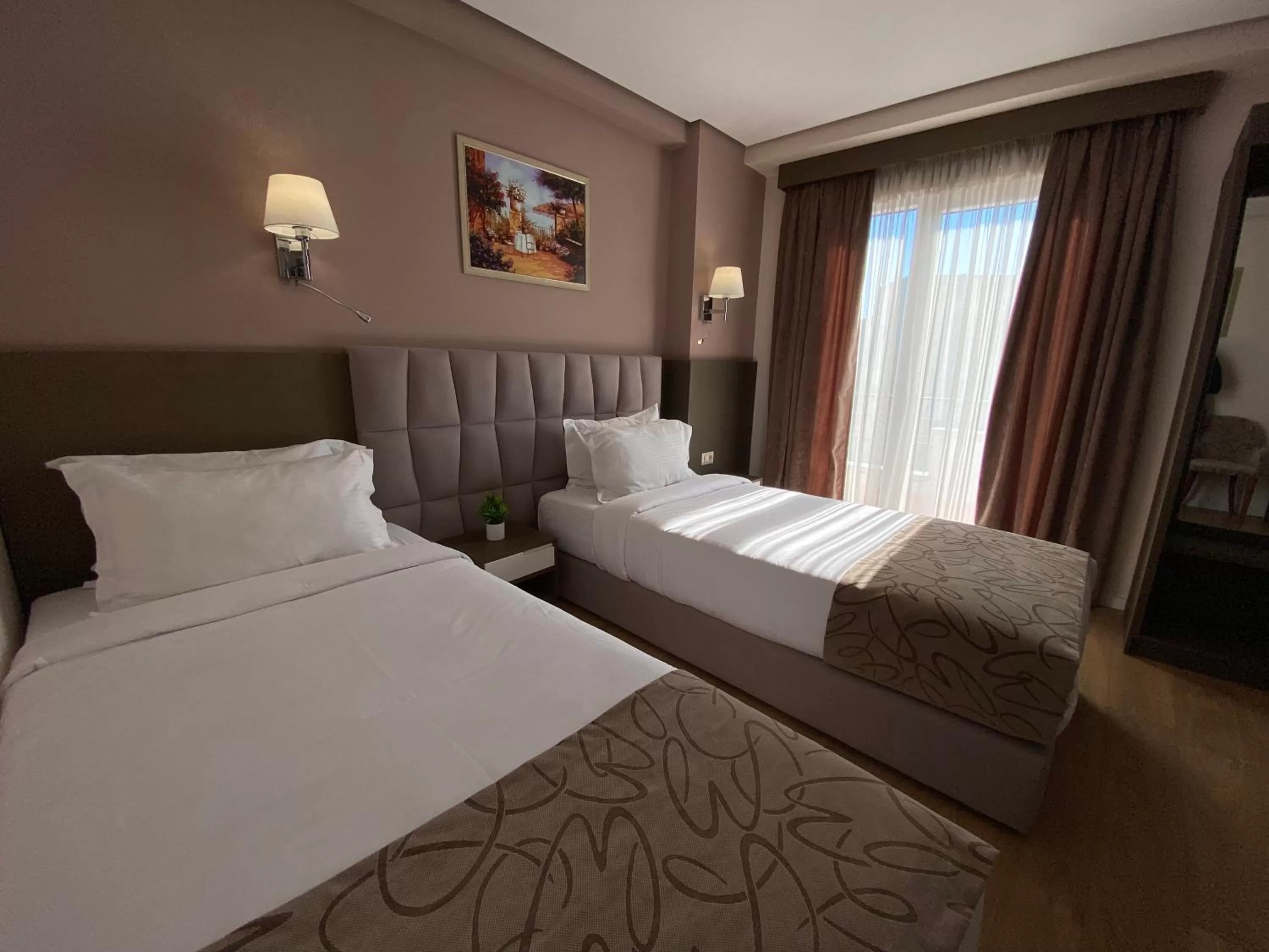 Bed in Doanesia Premium Hotel & Spa