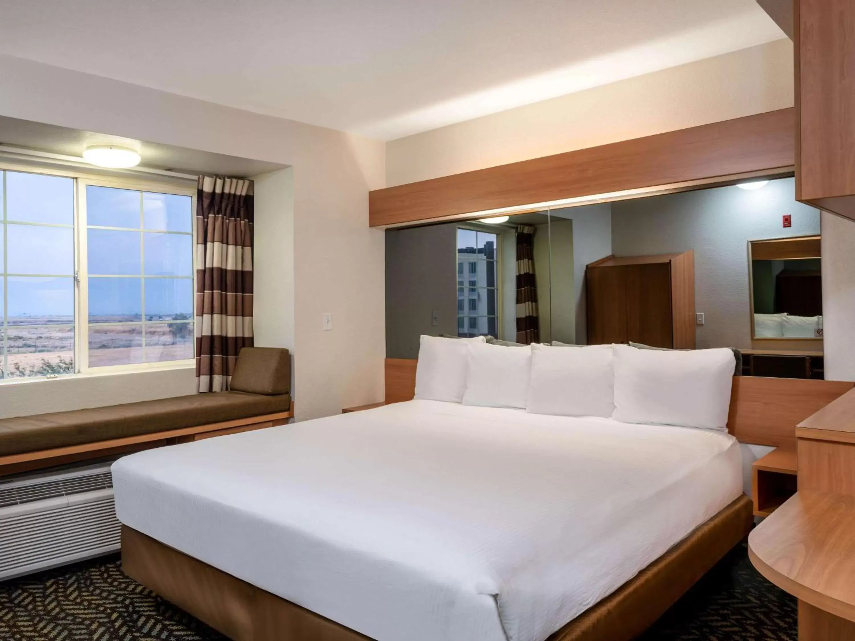 Photo of the whole room, Bed in Microtel Inn & Suites by Wyndham Salt Lake City Airport