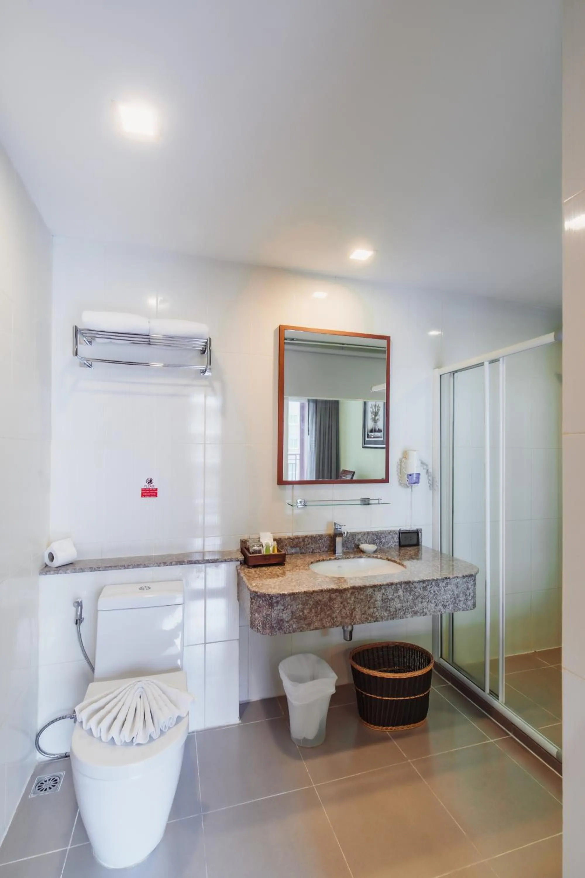 Shower in Elite Suites Patong