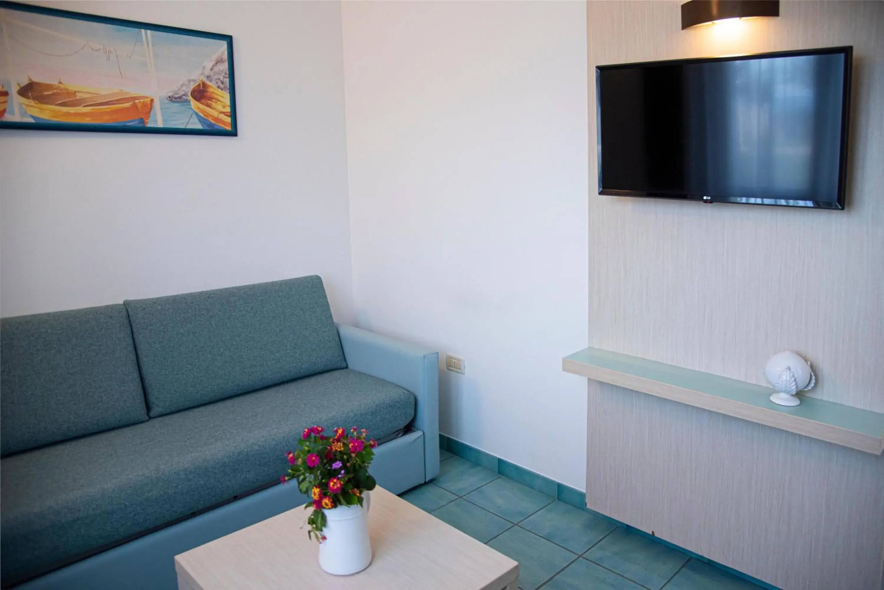 TV and multimedia, Seating Area in Pietrablu Resort & Spa - CDSHotels