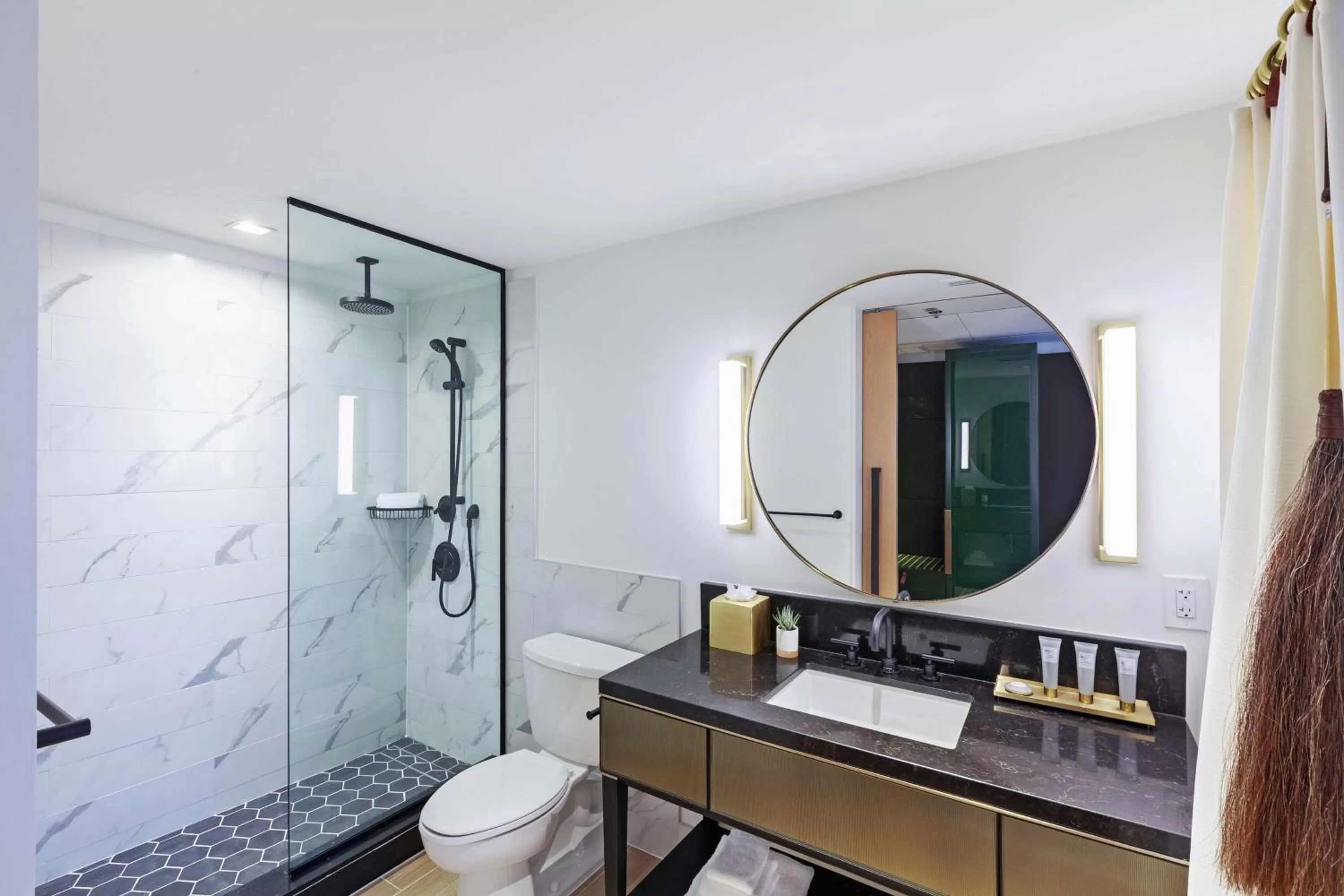 Bathroom in C. Baldwin, Curio Collection by Hilton