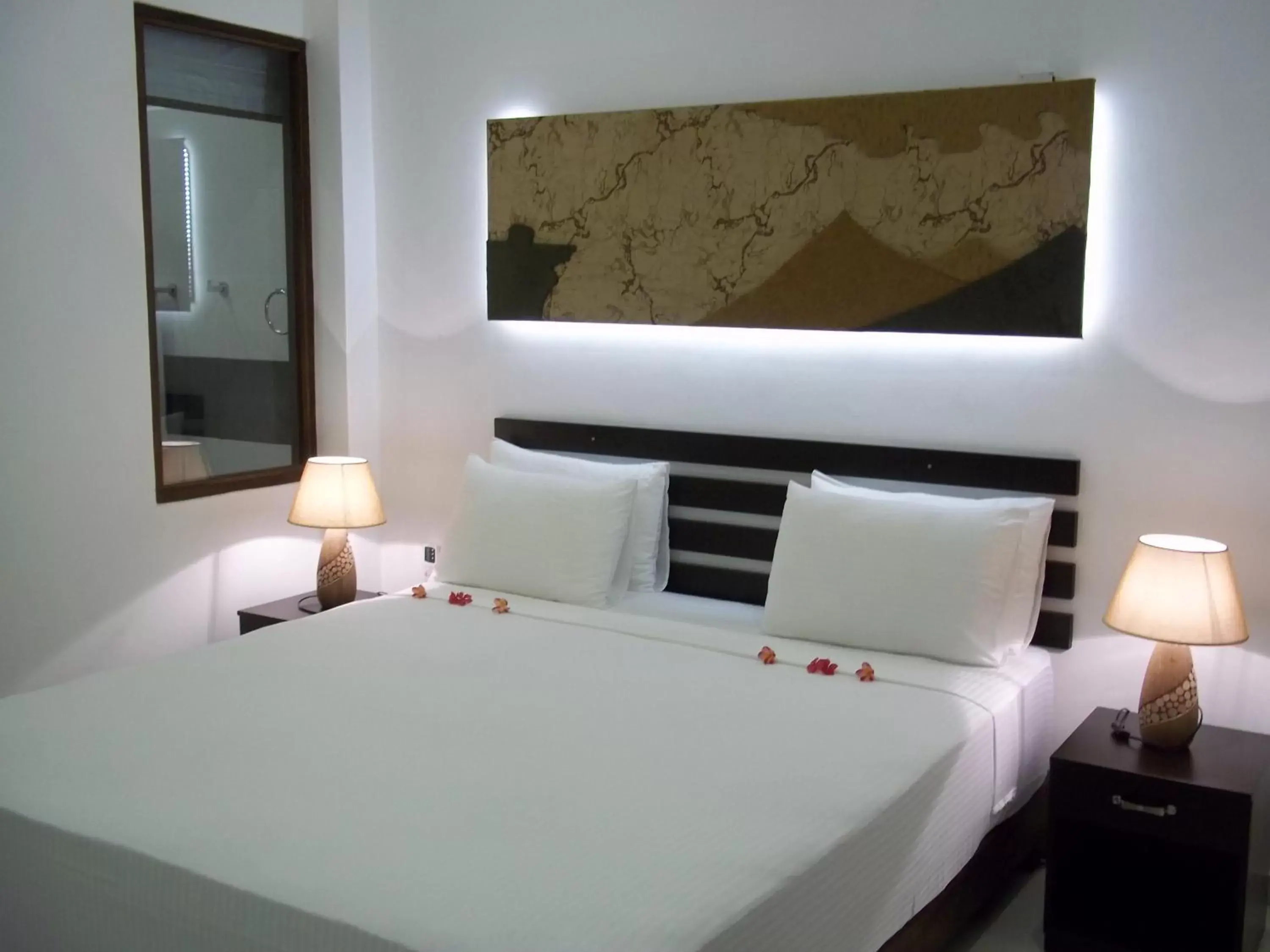 Bed in Sunrise Palace Negombo Bed in Sunrise Palace Negombo