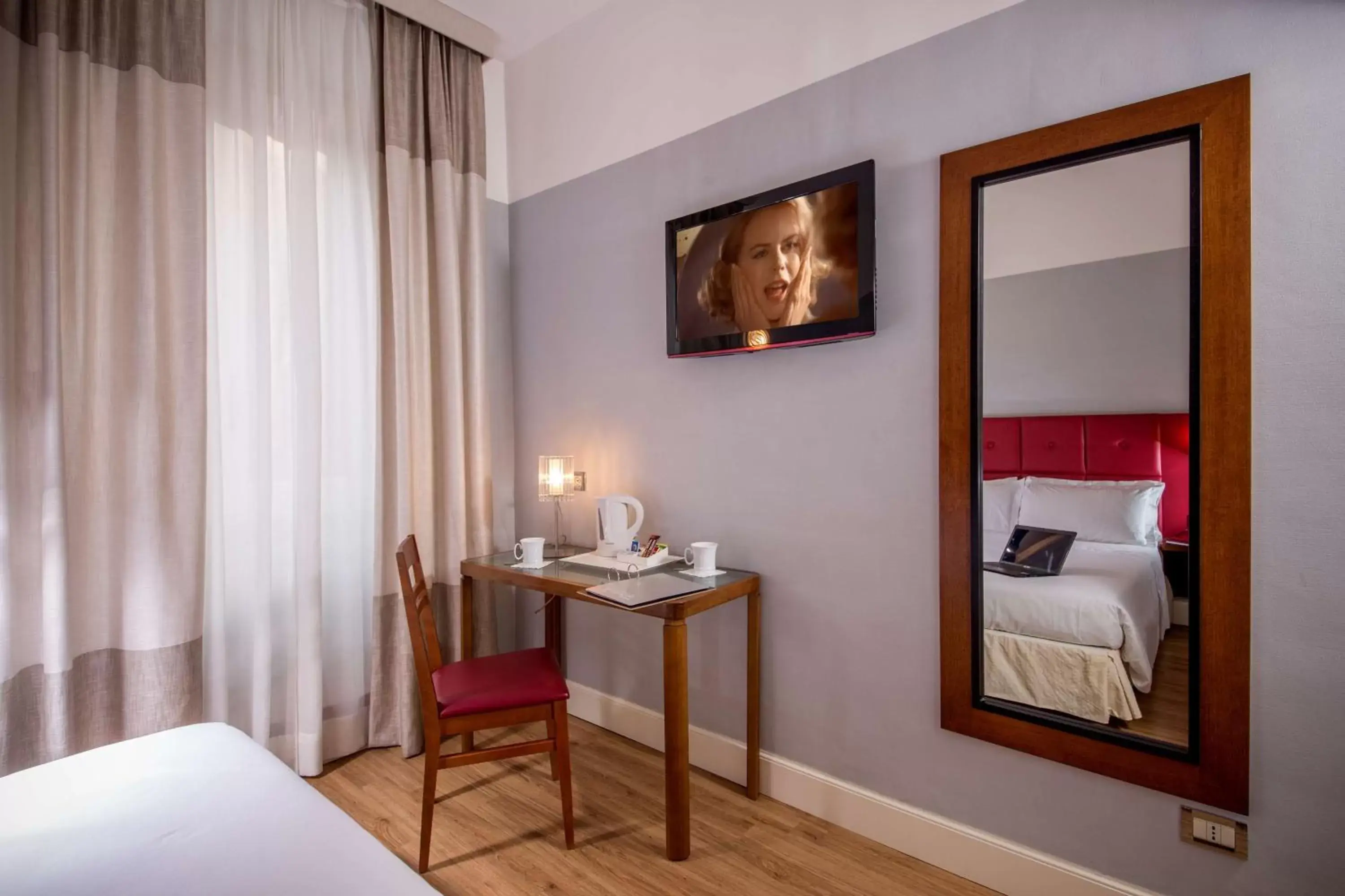 Bedroom, TV/Entertainment Center in Best Western Hotel Astrid