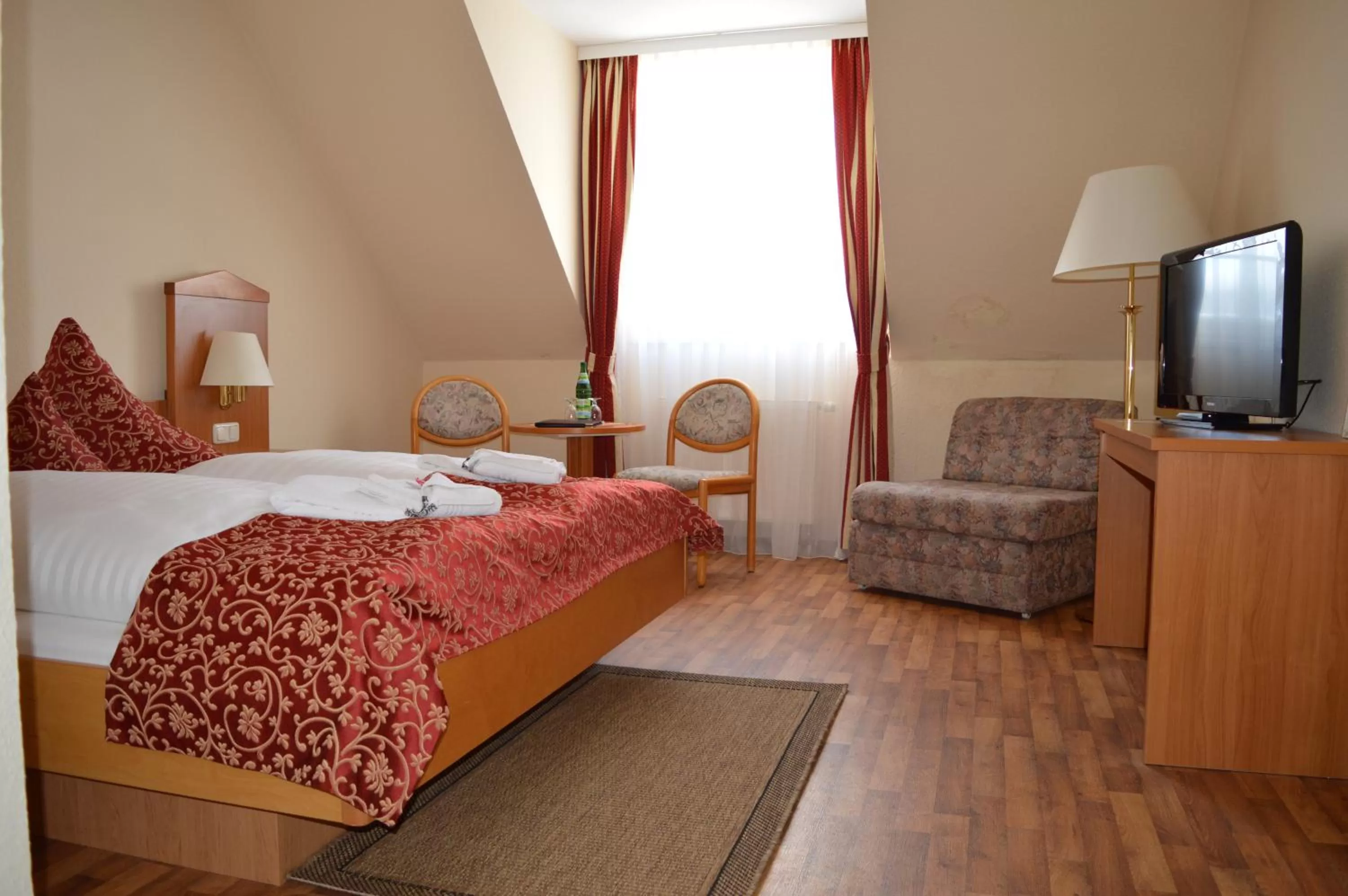 Photo of the whole room, Bed in Hotel Auerhahn