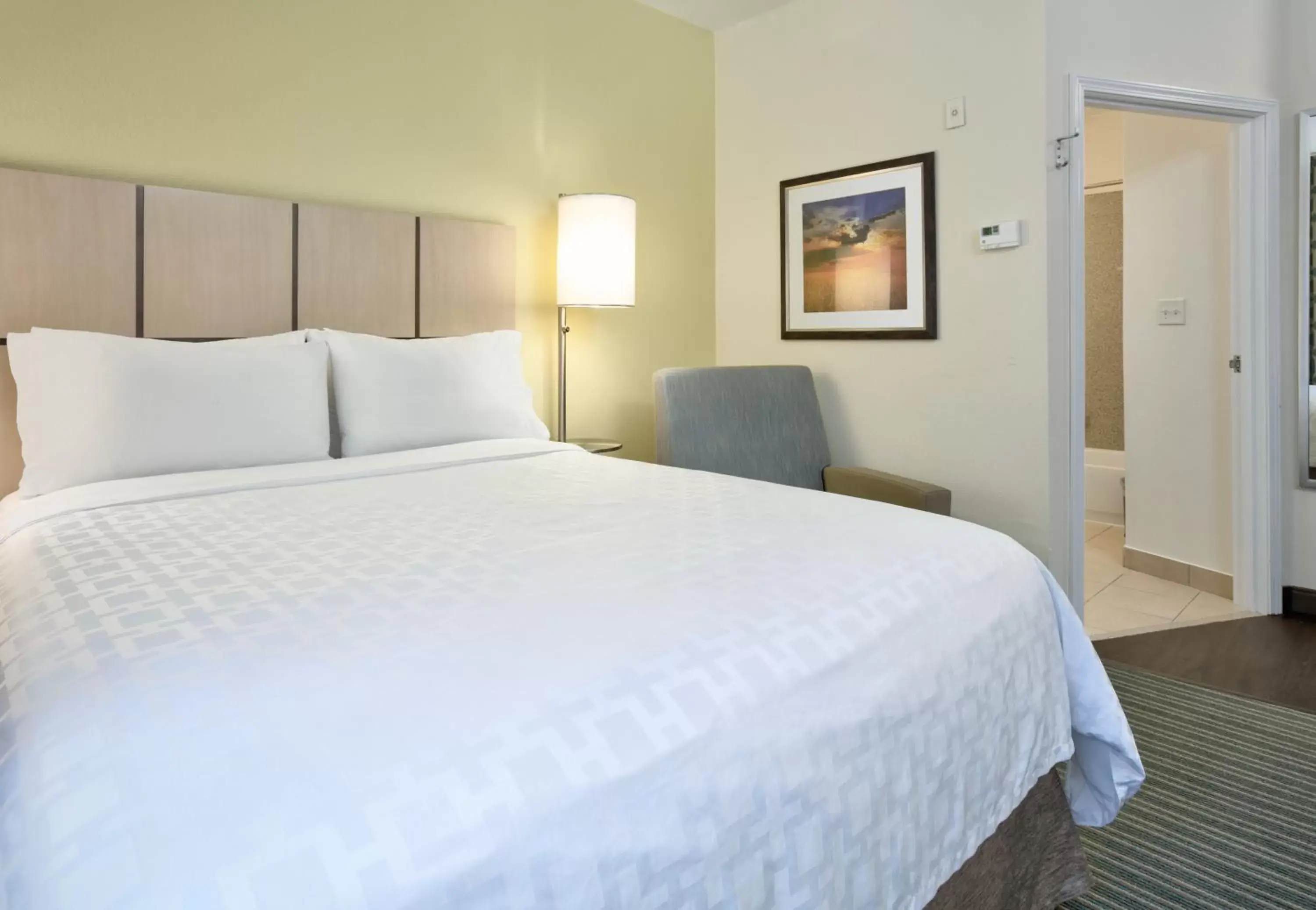 Photo of the whole room, Bed in Candlewood Suites Dallas Fort Worth South, an IHG Hotel