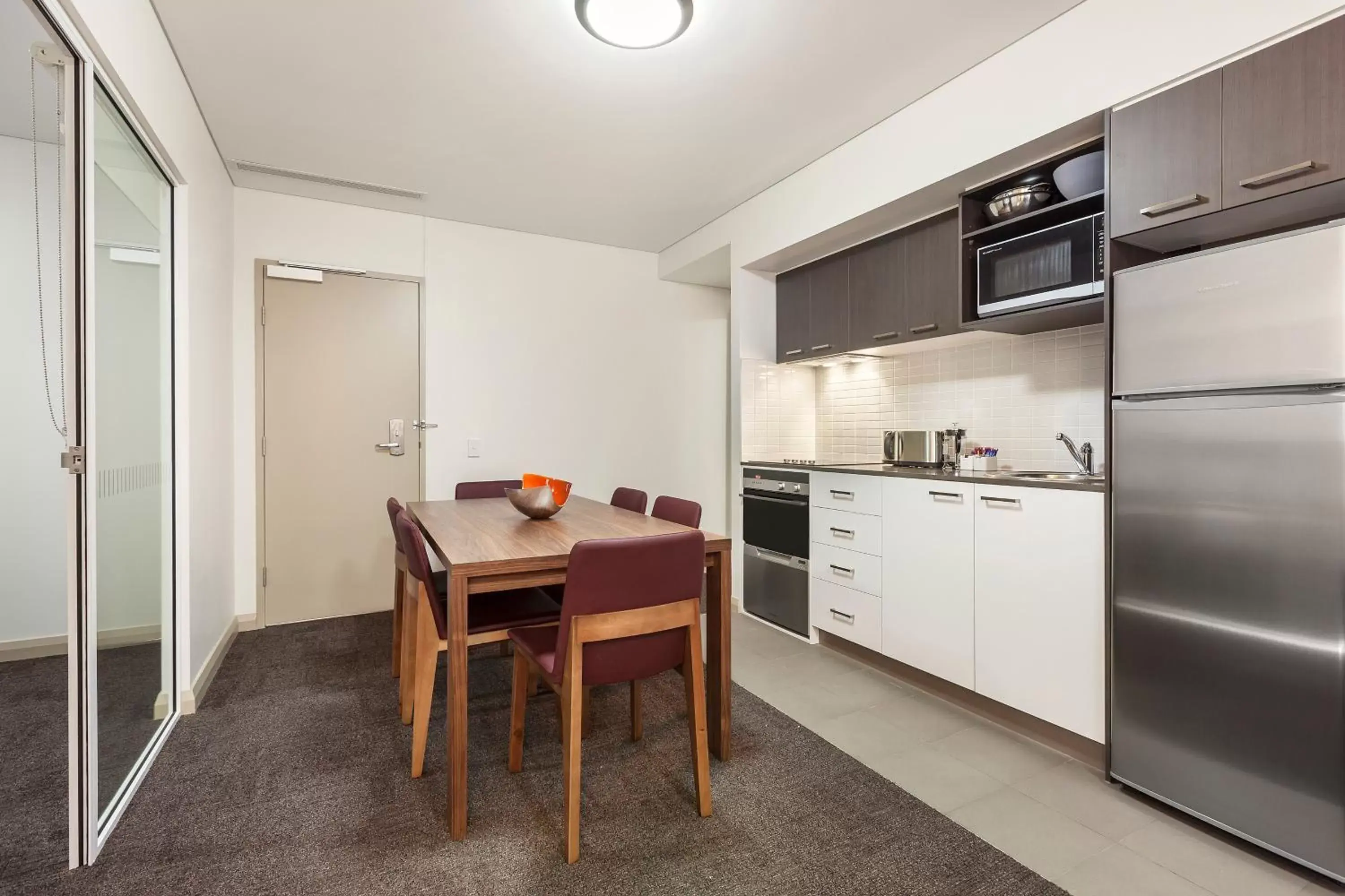 Kitchen or kitchenette, Dining Area in Quest at Sydney Olympic Park