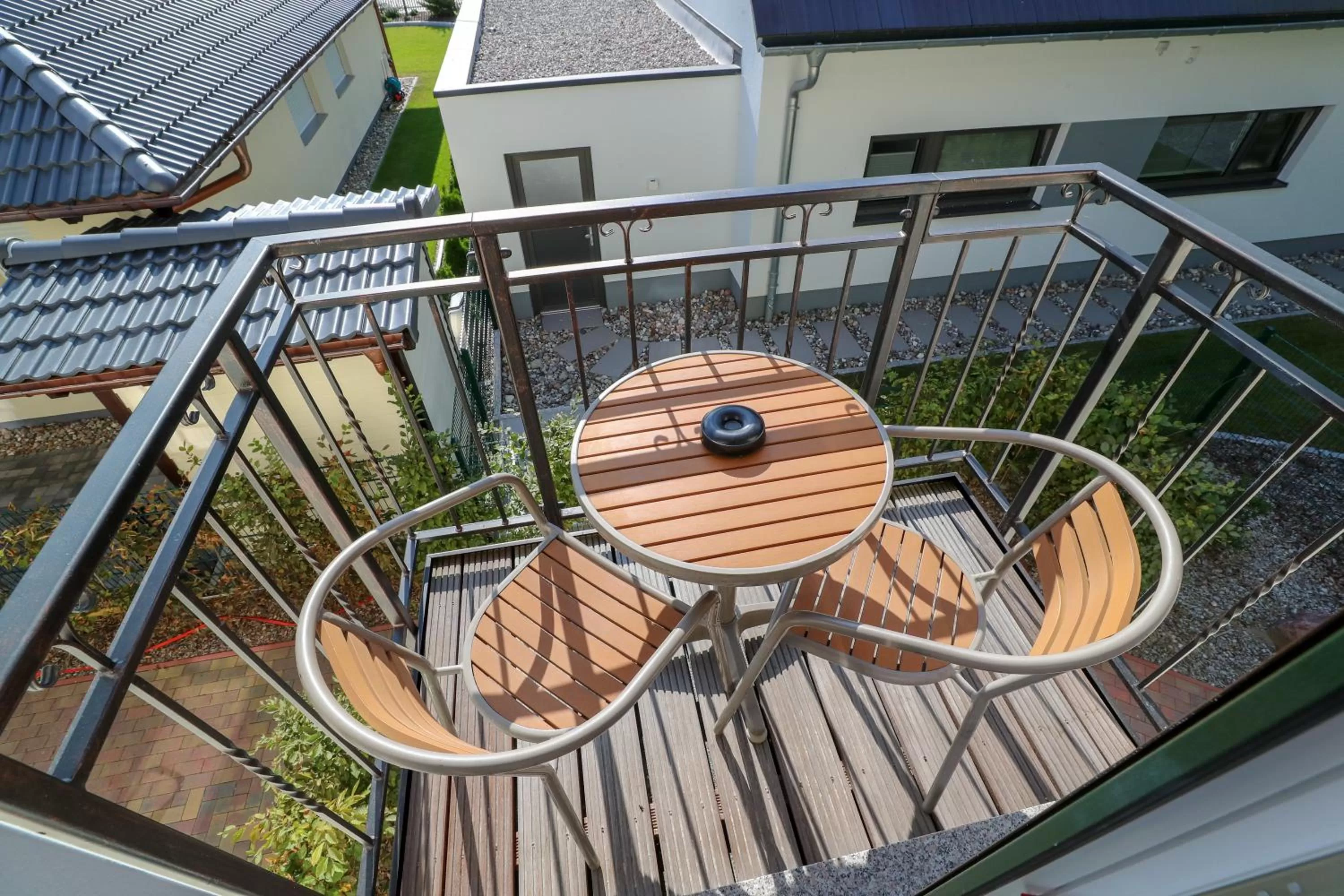 Inner courtyard view, Balcony/Terrace in Usedom Bike Hotel & Suites