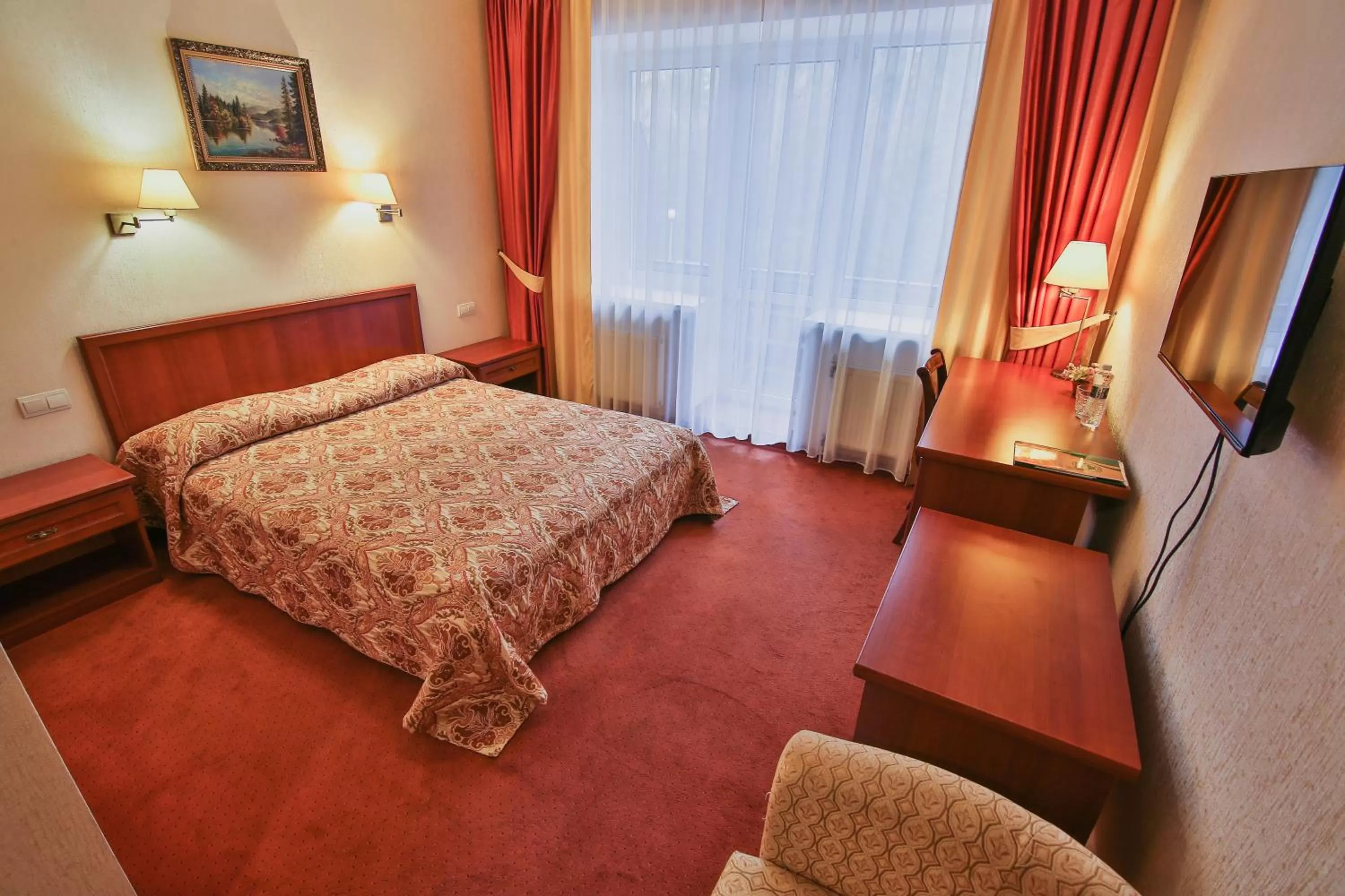 Bed in Ukraina Hotel