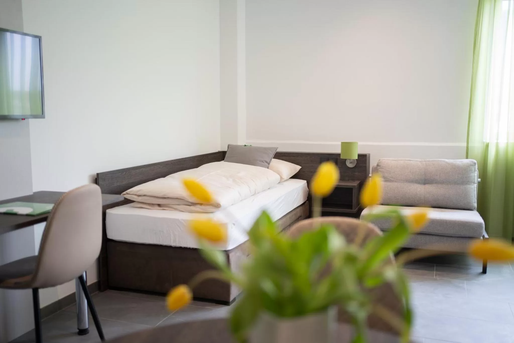 Photo of the whole room, Bed in eee Hotel Liezen