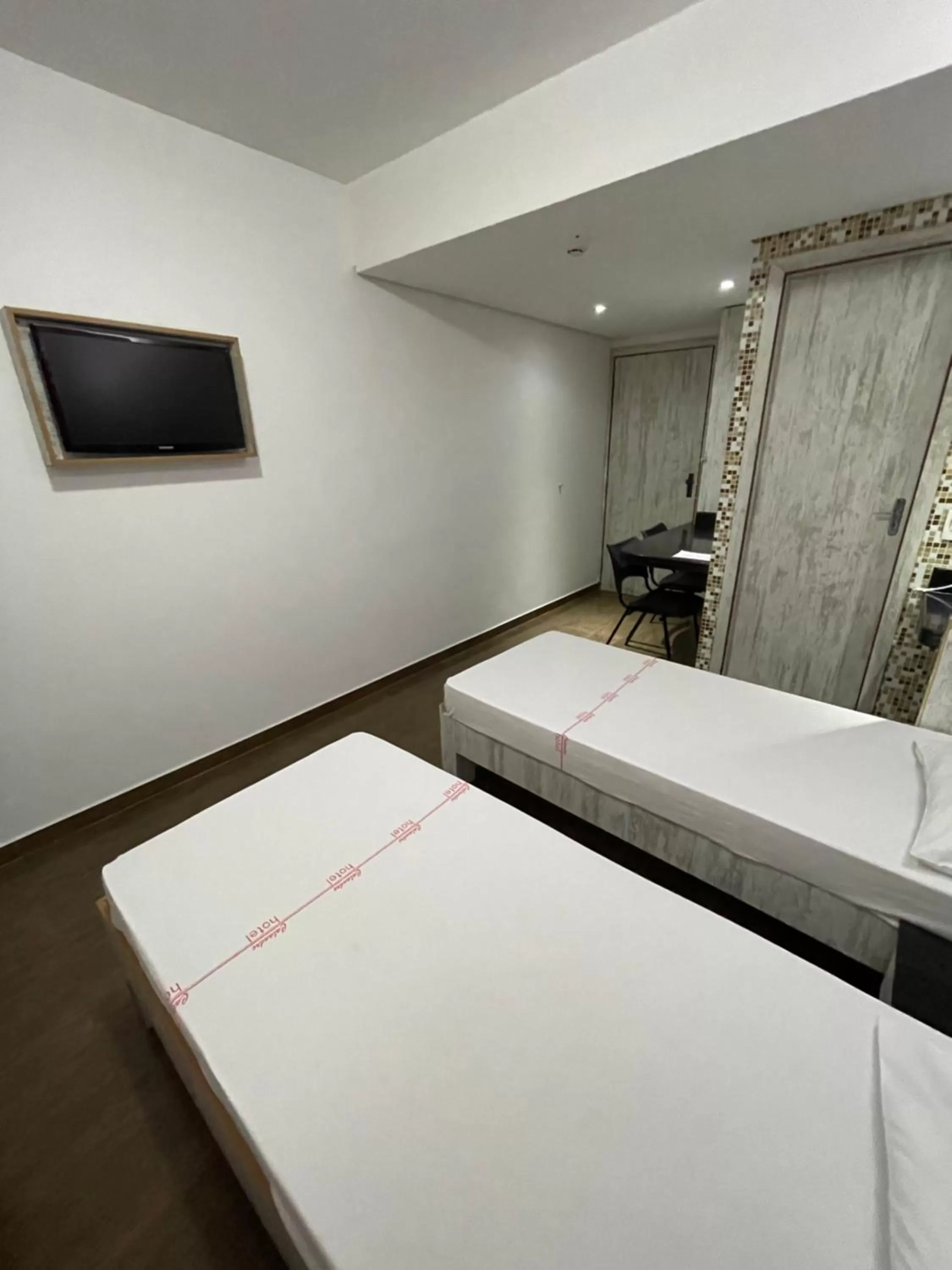 Bed in Calandre Hotel