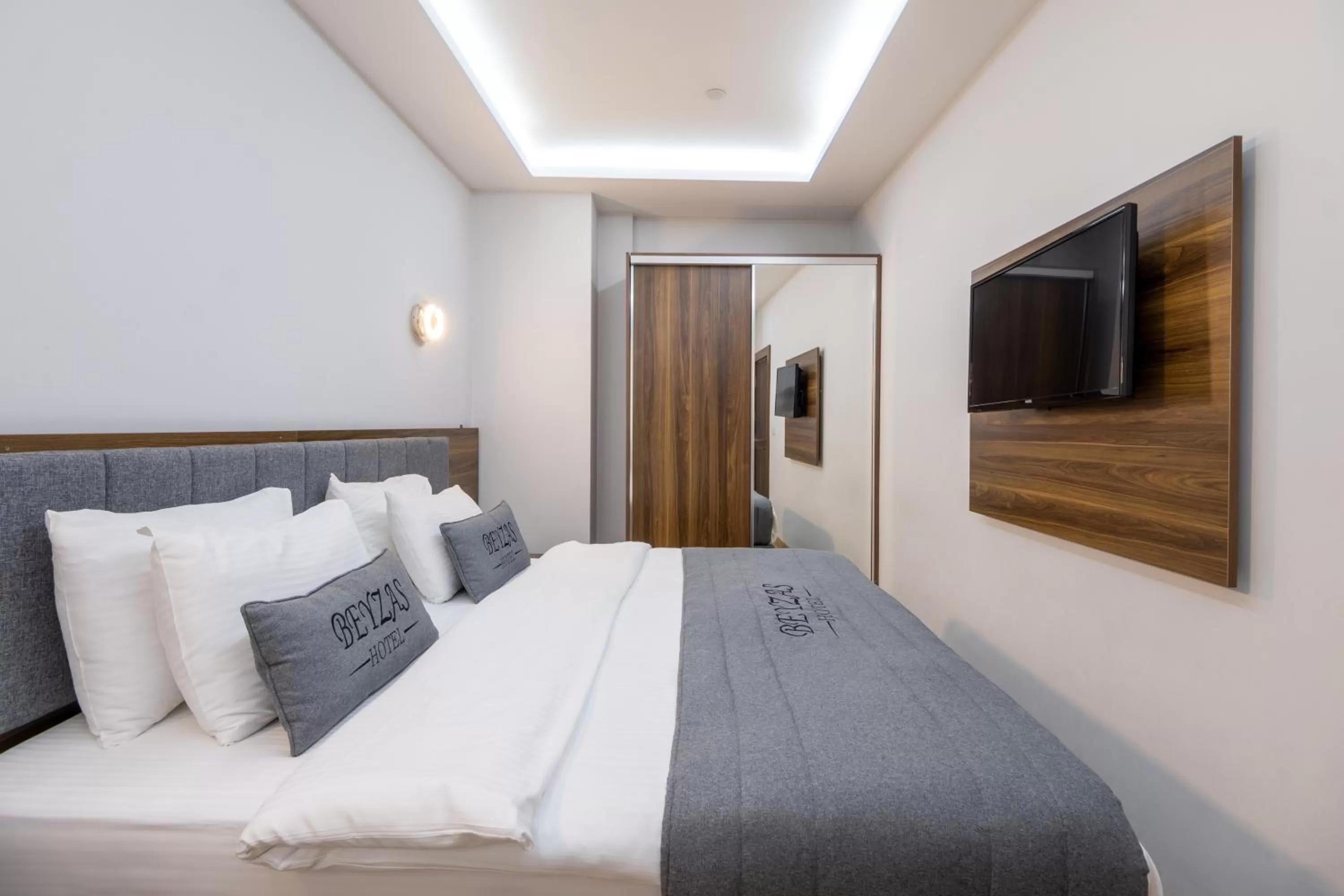 Communal lounge/ TV room, Bed in Beyzas Hotels & Suites