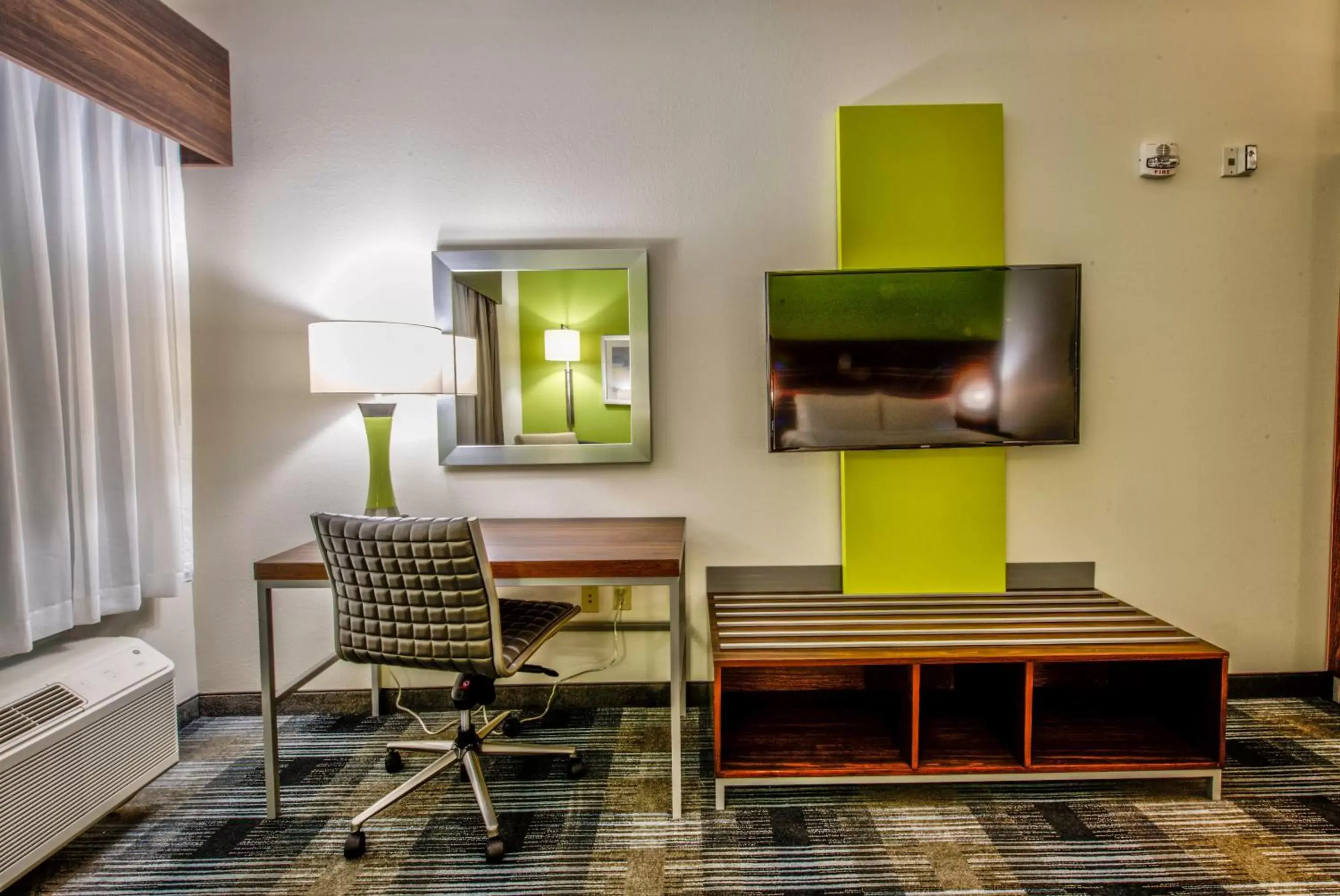 Photo of the whole room, TV/Entertainment Center in Holiday Inn Express & Suites - Farmers Branch, an IHG Hotel