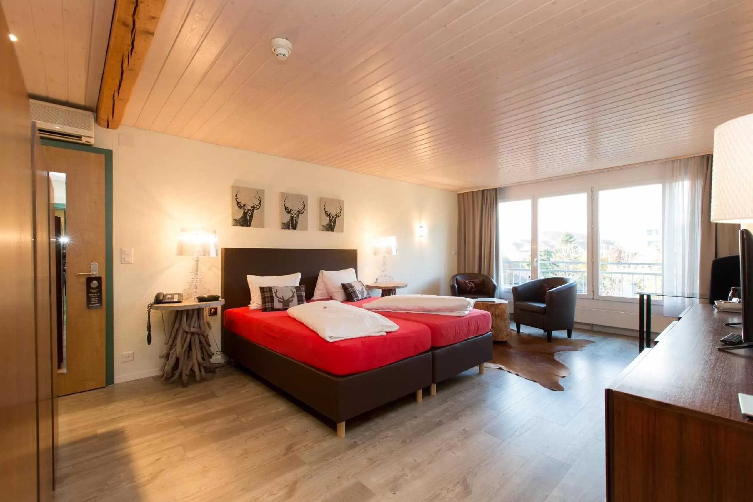 Photo of the whole room, Bed in Hotel Landhaus Säntis Herisau