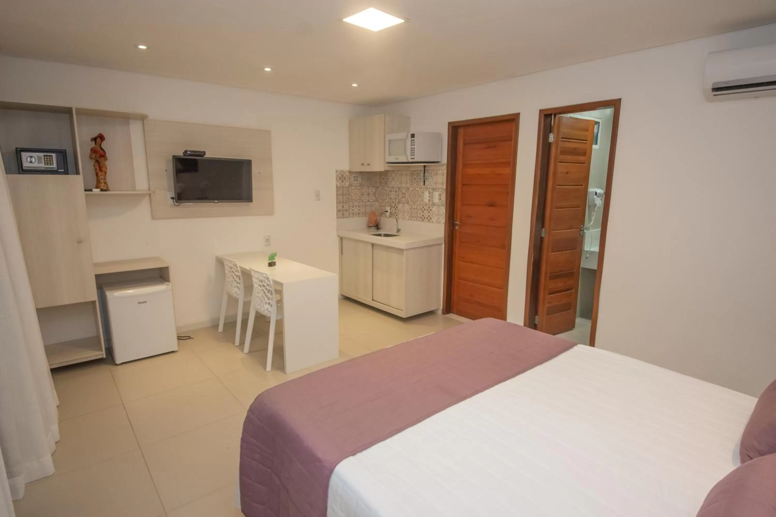 Bed in Pousada Sol e Mar