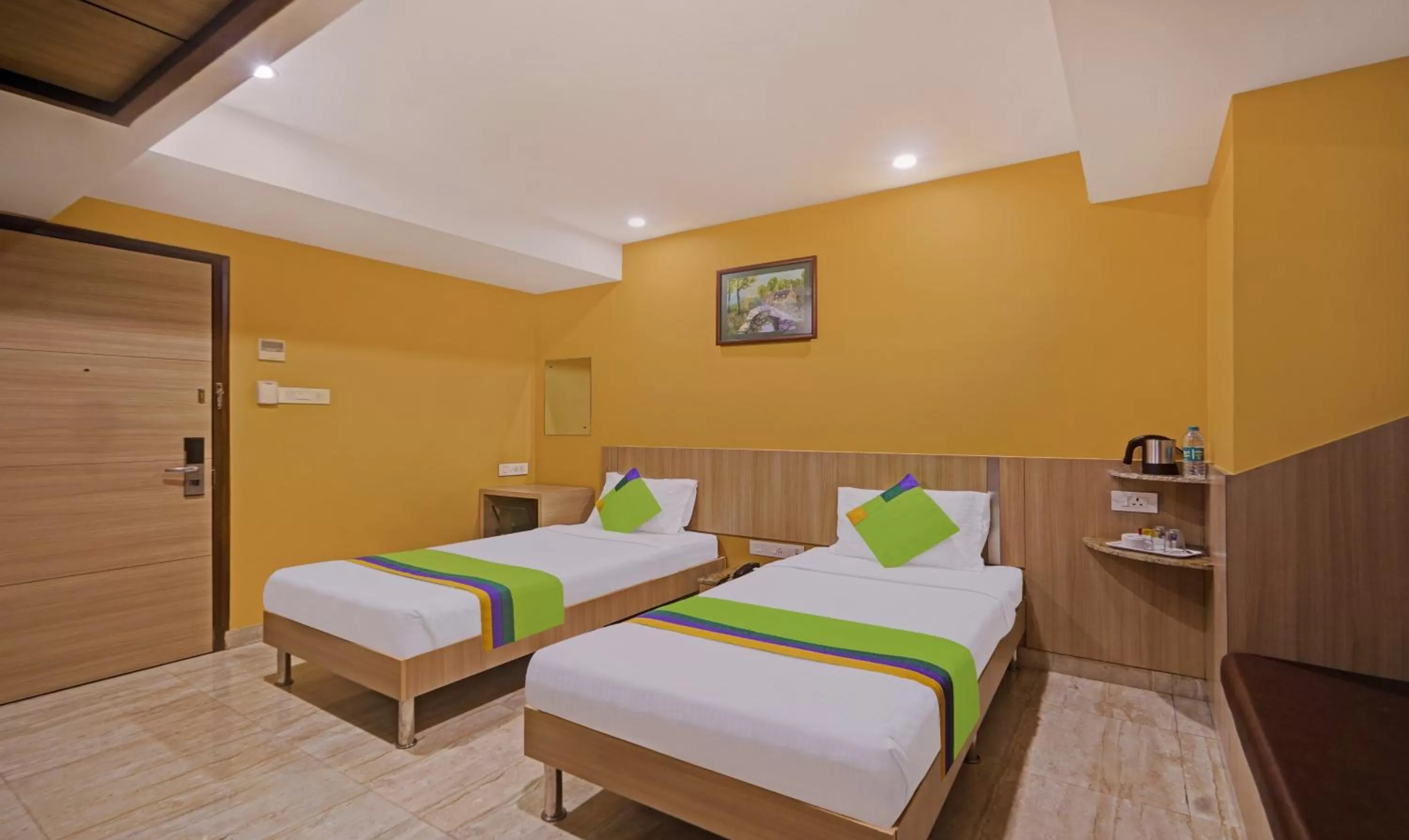 Bedroom, Bed in Treebo Fourth Avenue