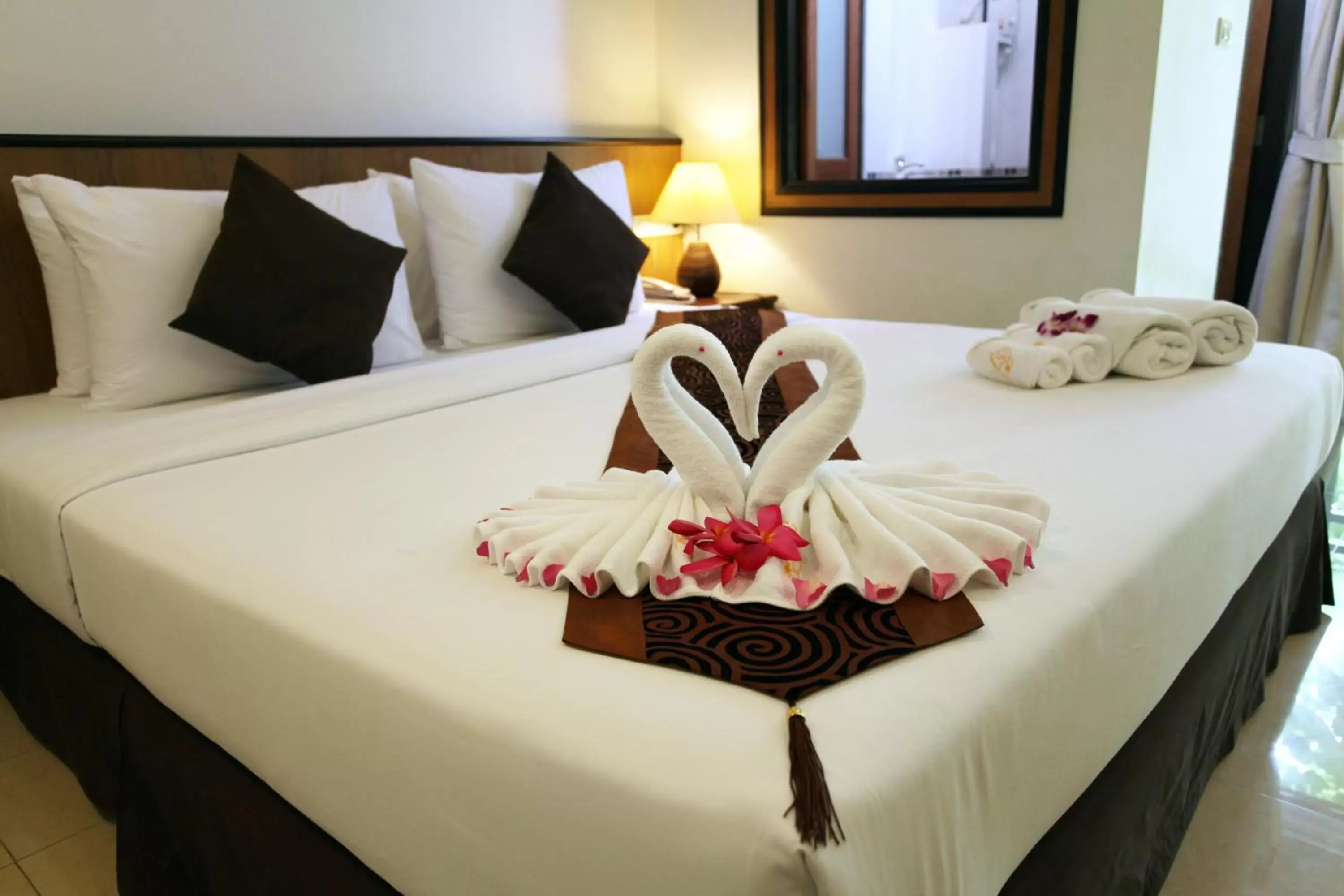 Decorative detail, Bed in Rapeepan Ville Hotel