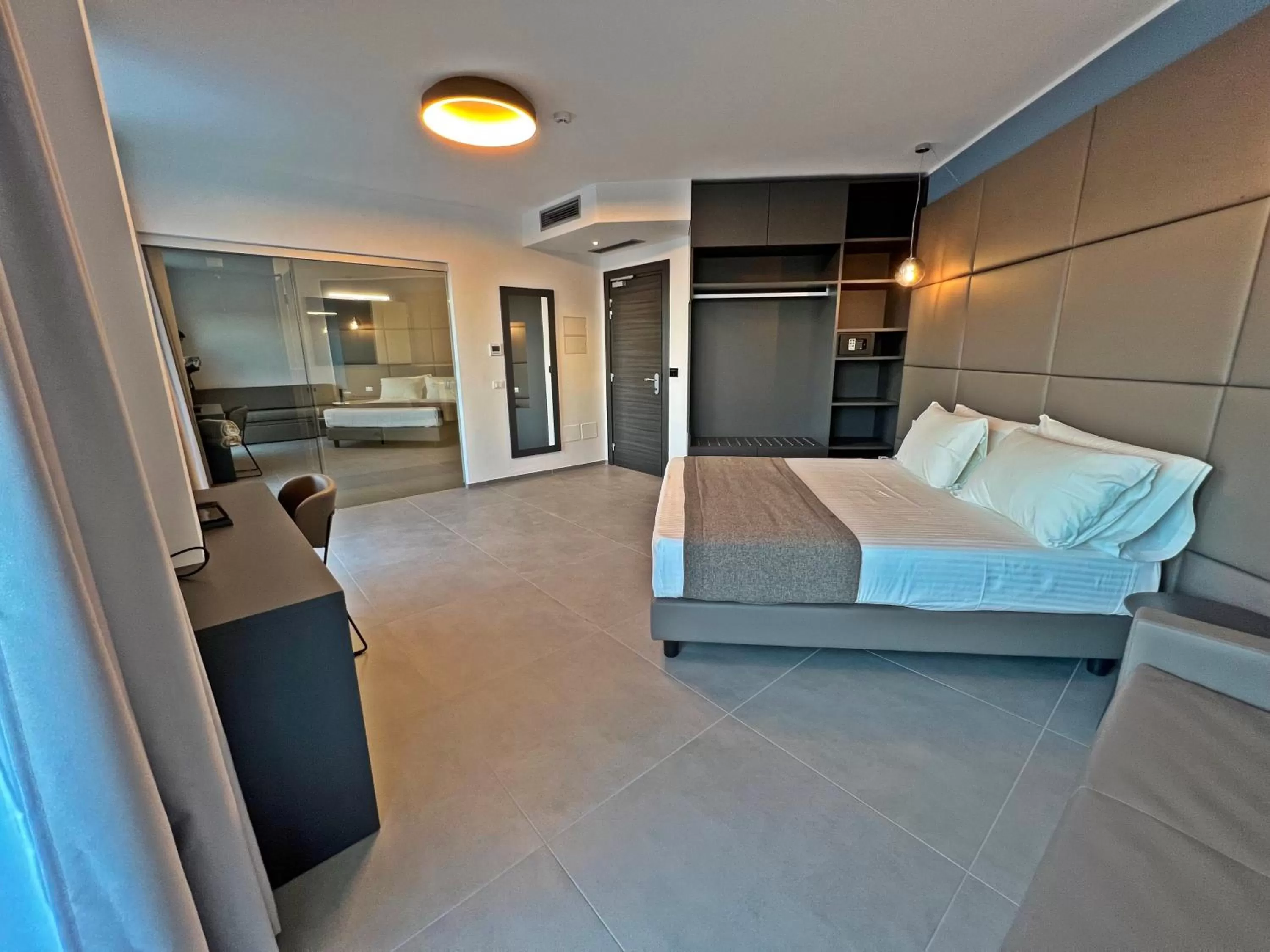 Bed in Resort La Battigia Beach & Spa