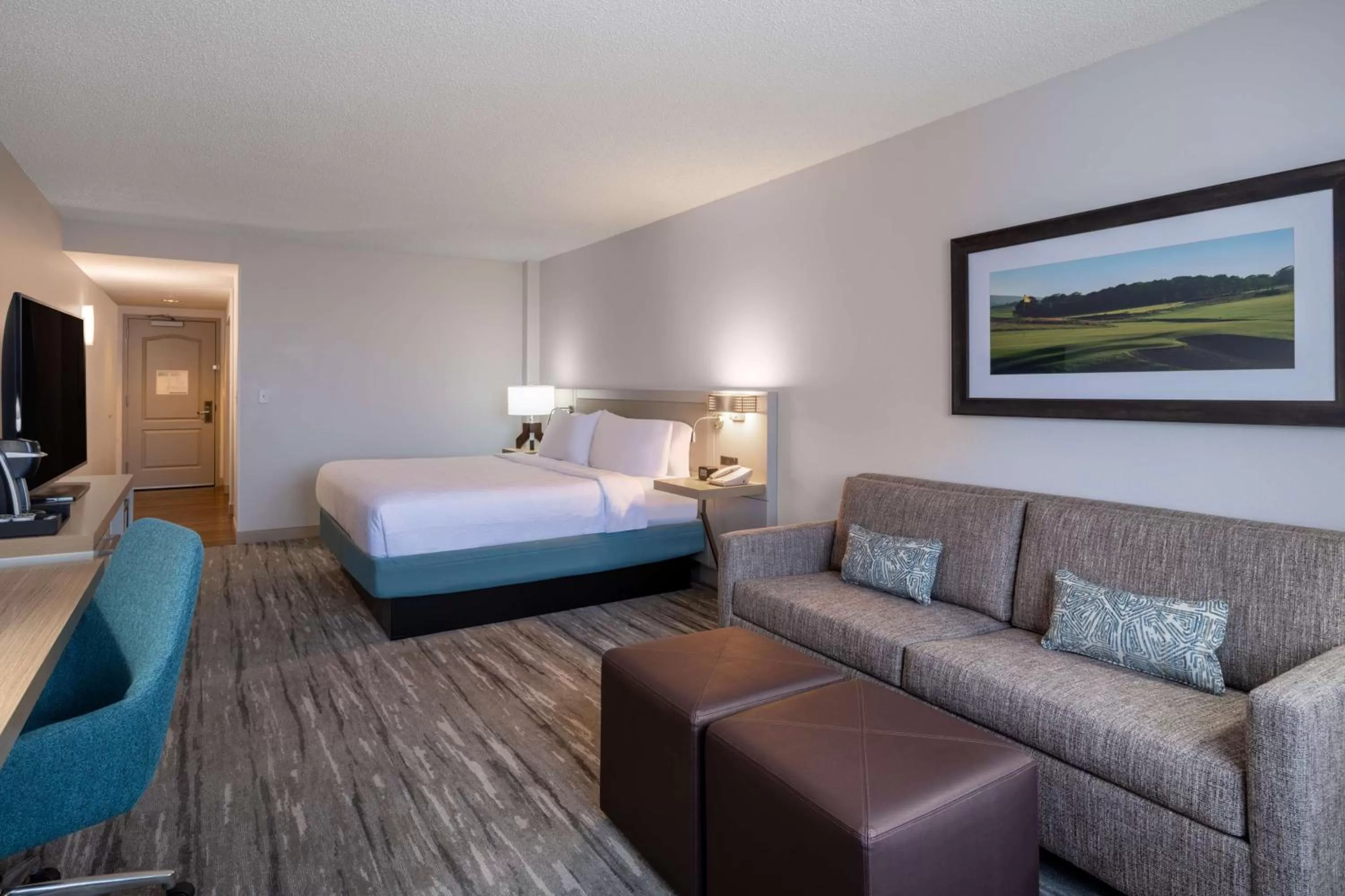 Living room, Bed in Hilton Garden Inn Jacksonville Ponte Vedra Sawgrass