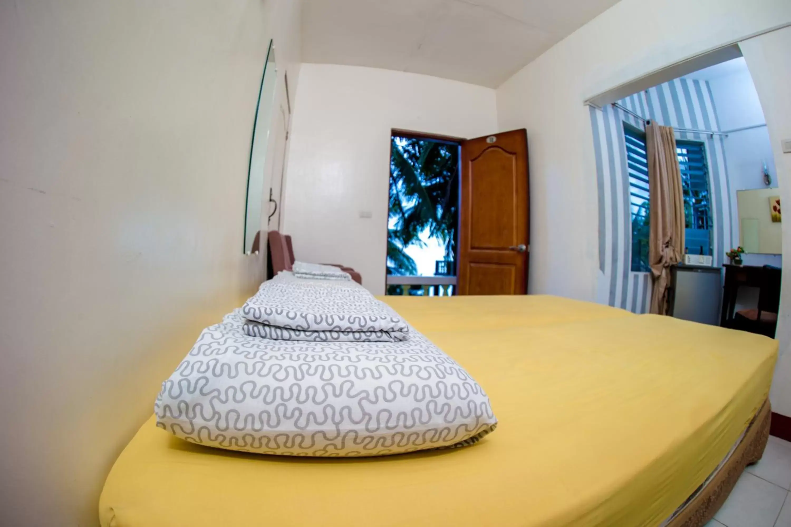 Bed in Oslob Seafari Resort