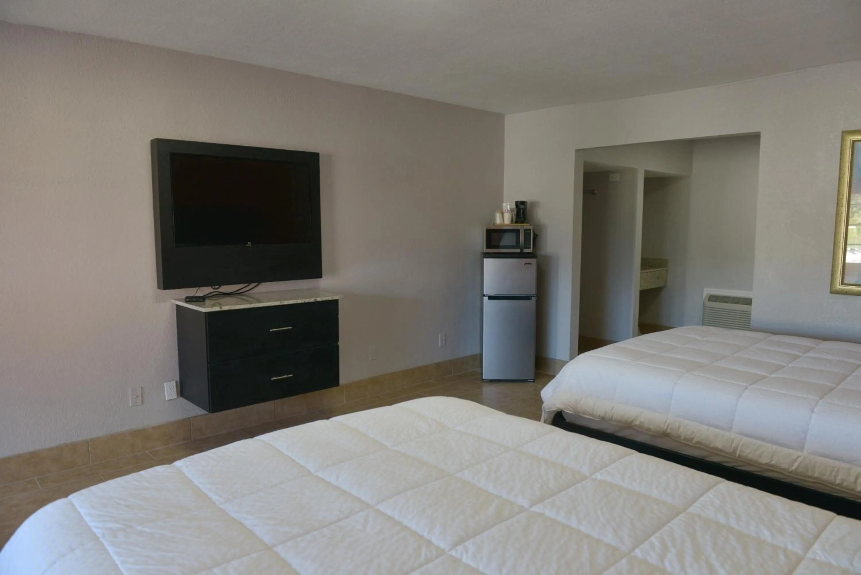 Bed in Rodeway Inn & Suites Winter Haven Chain of Lakes