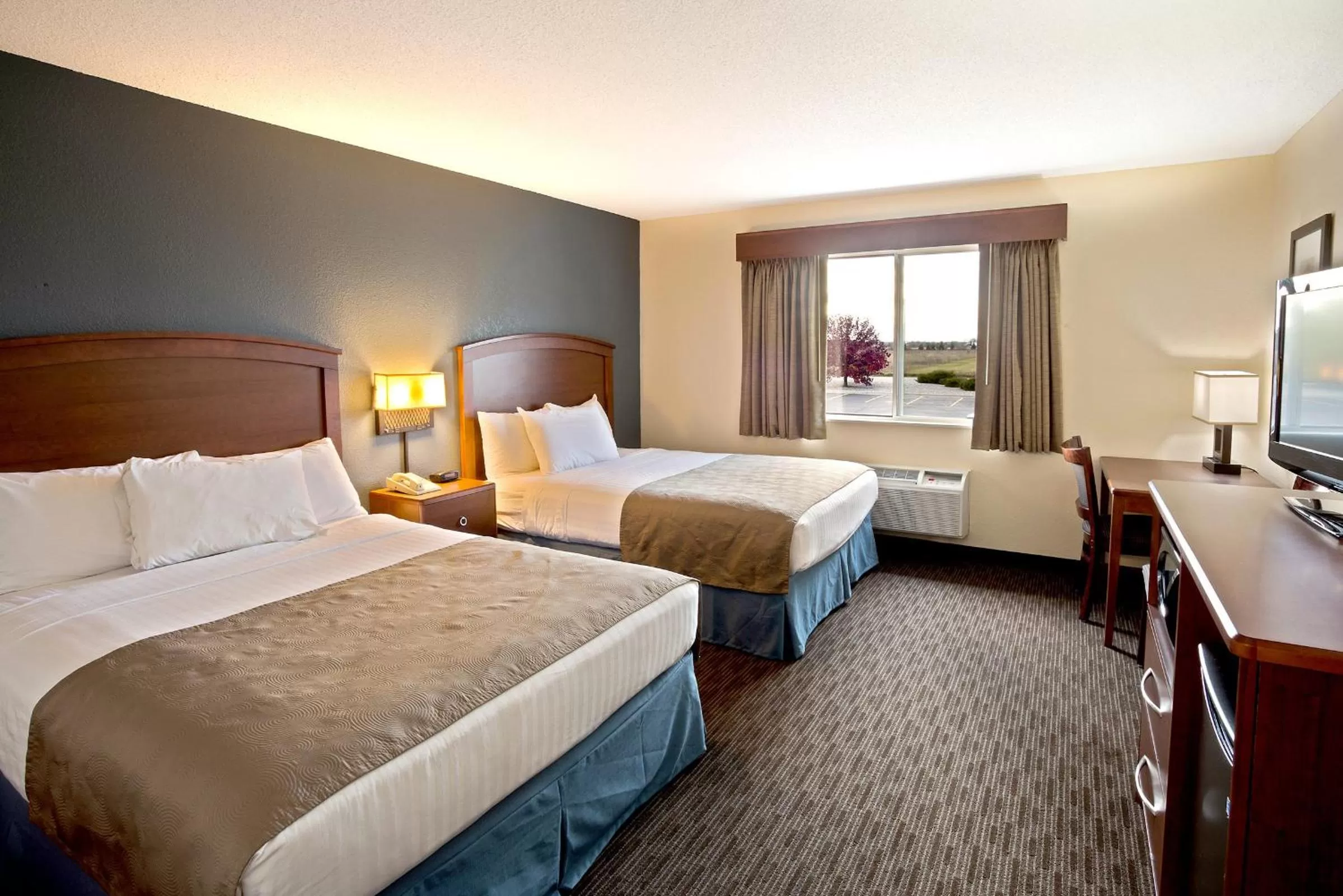 Photo of the whole room, Bed in AmericInn by Wyndham Bay City