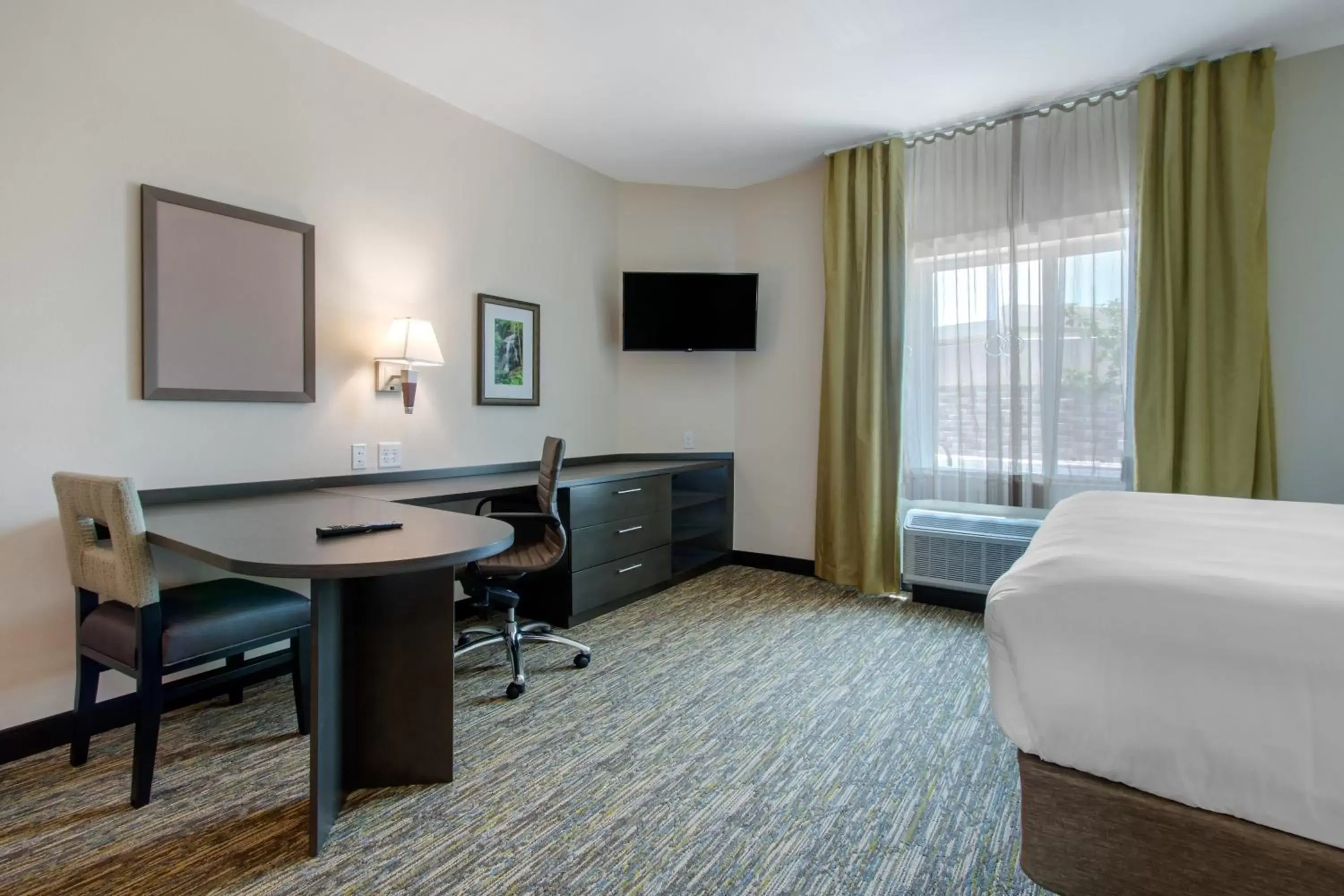 Bedroom, TV/Entertainment Center in Candlewood Suites - San Antonio Lackland AFB Area, an IHG Hotel