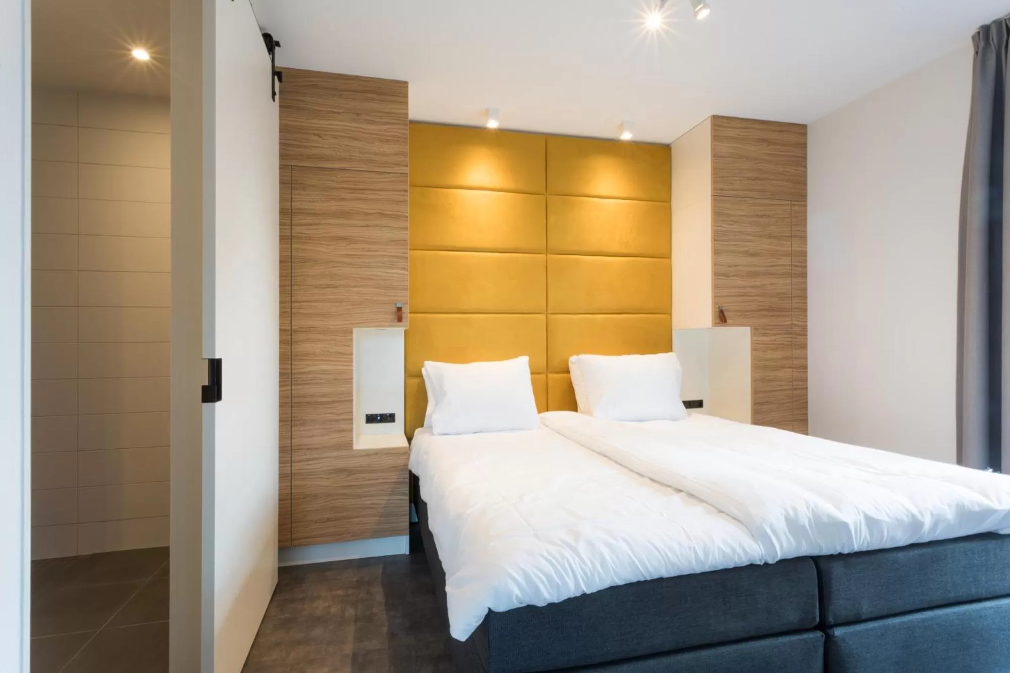 Bedroom, Bed in Hotel Kaap West I Kloeg Collection