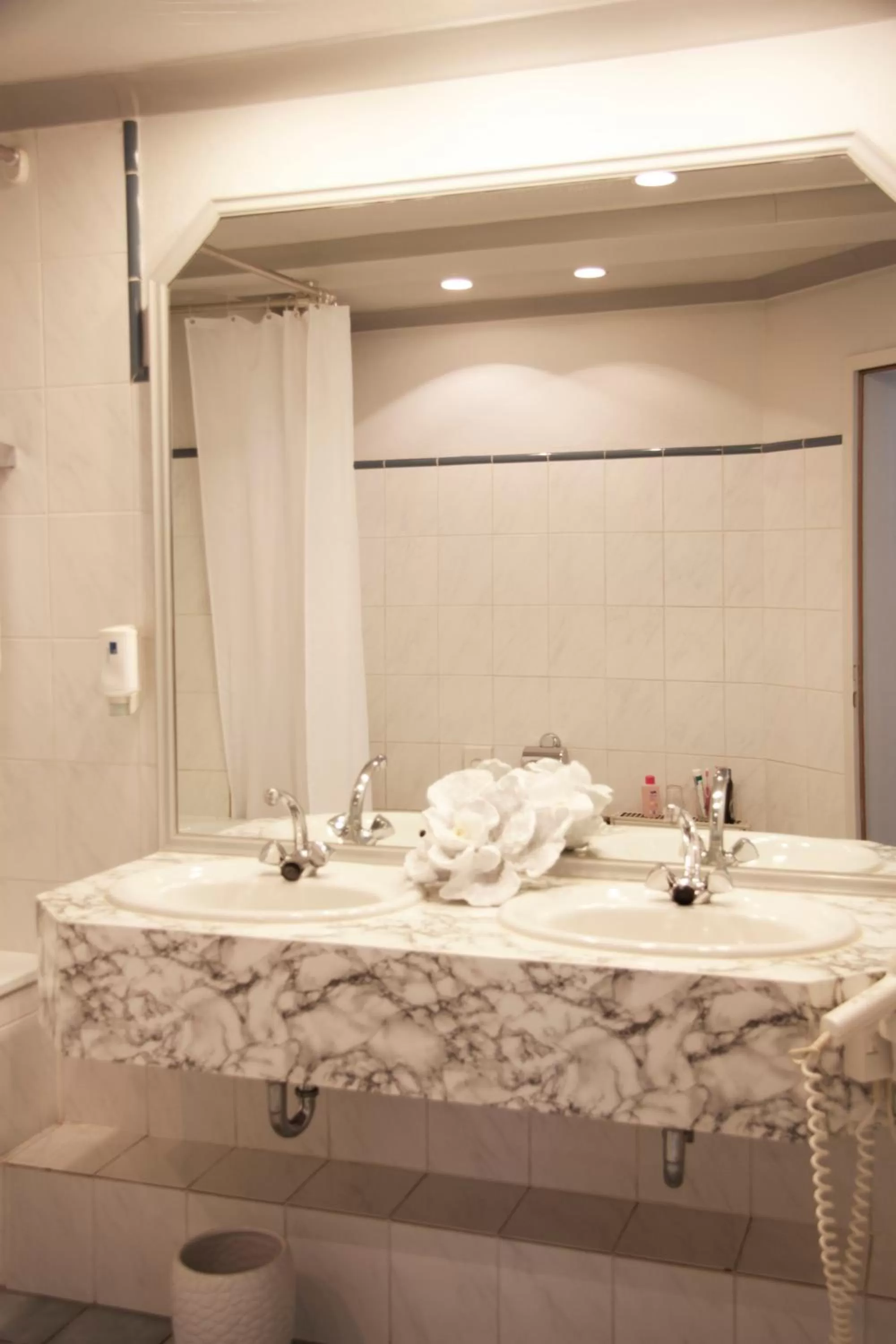 Bathroom in INA Hotel Royal