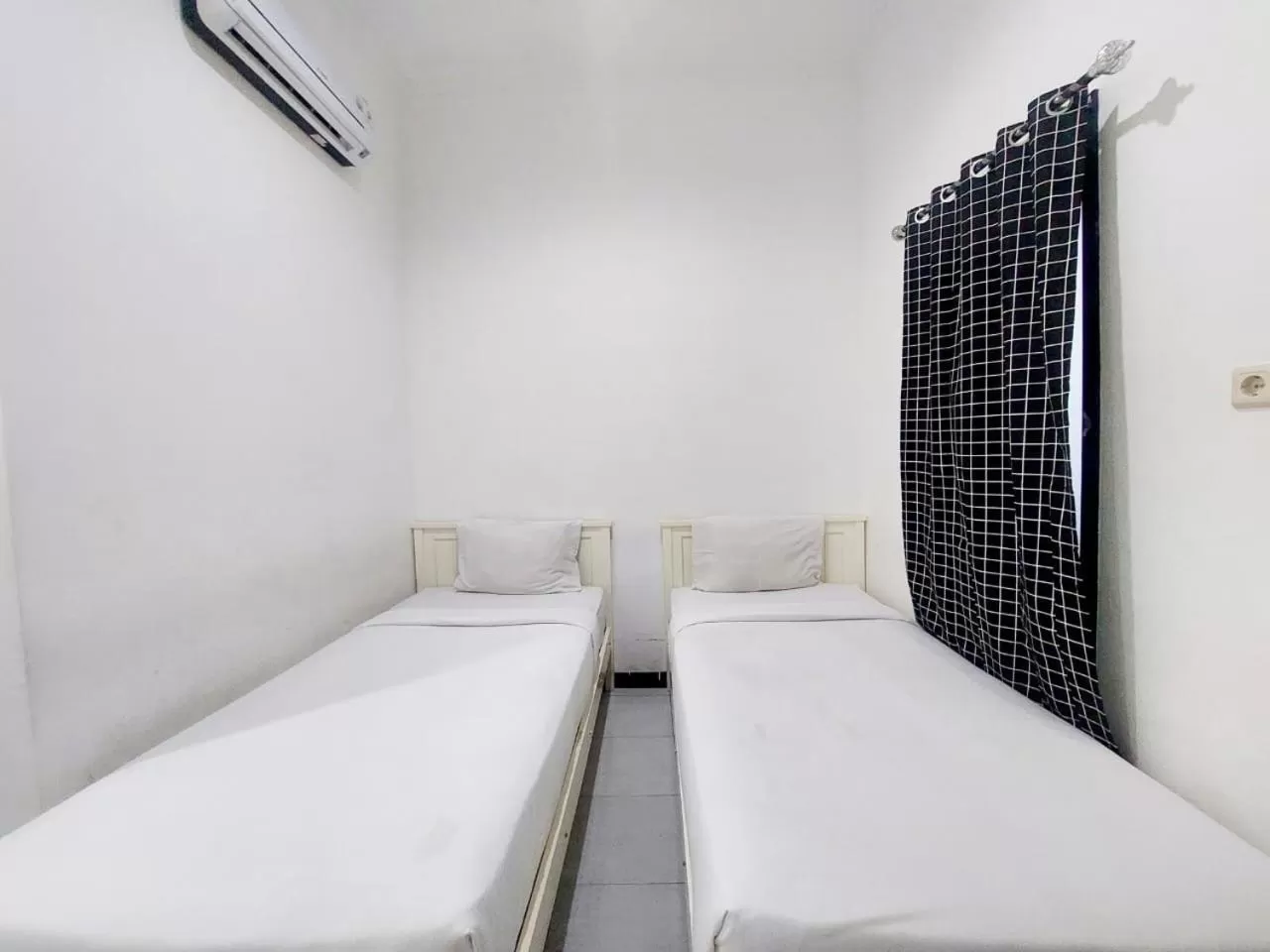 Bed in COZY STAY KUPANG