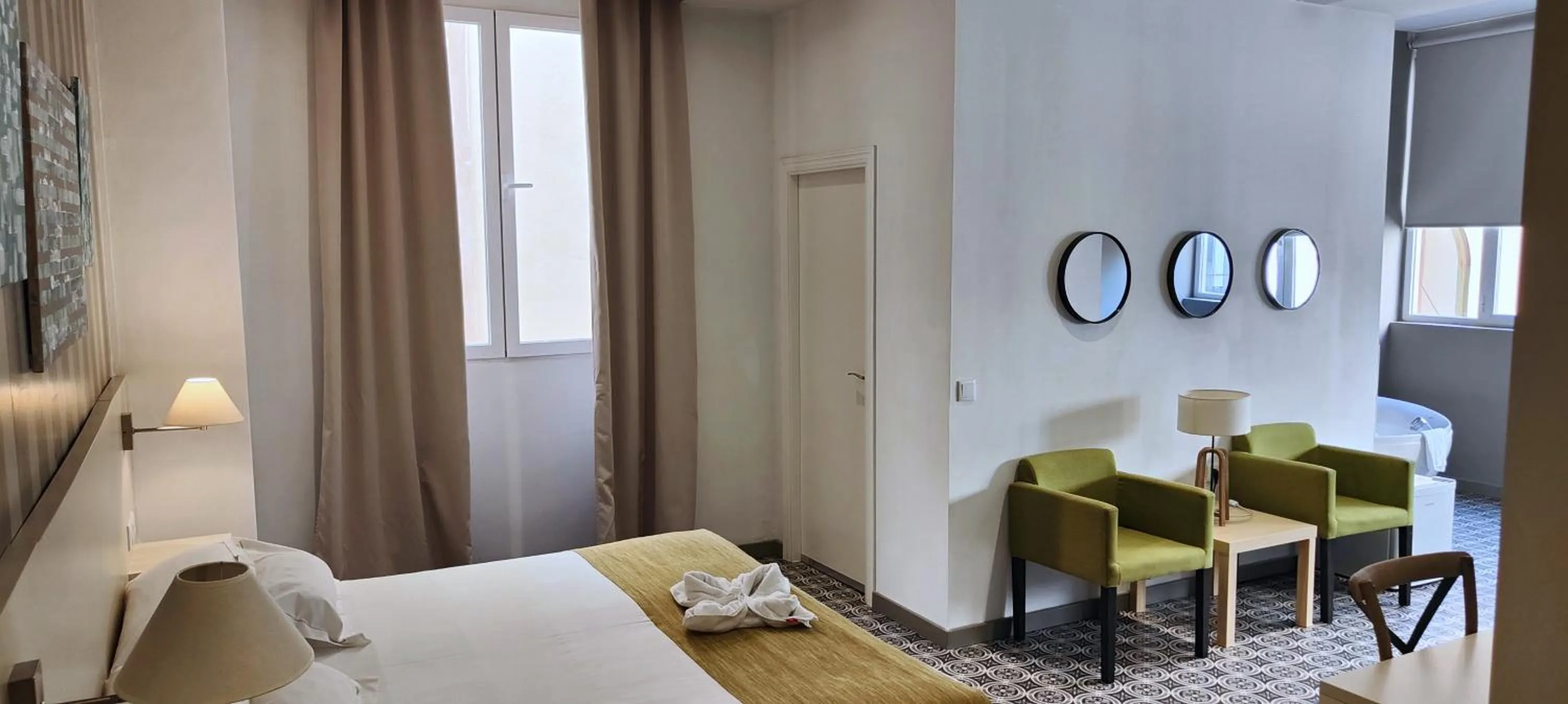 Bed in Hotel San Lorenzo Boutique Plaza