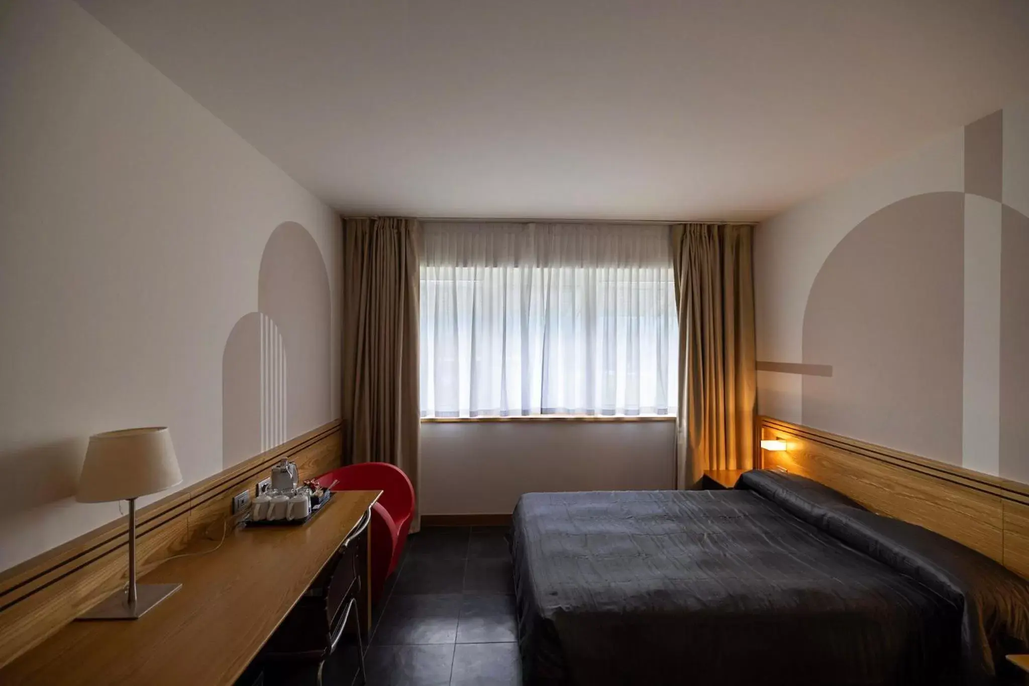 Photo of the whole room, Bed in Hotel Europa Belluno